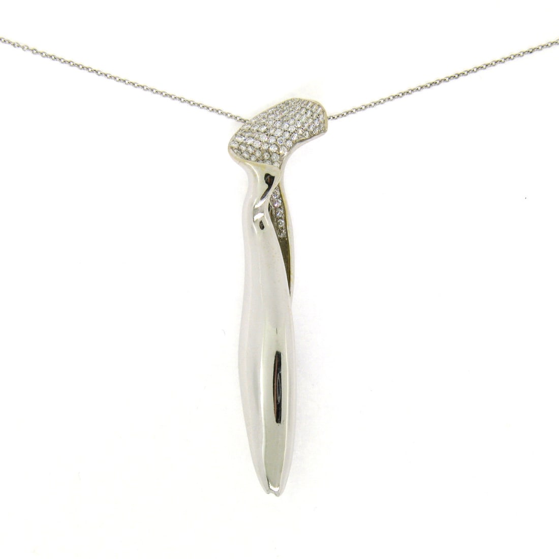Tiffany & Co. Frank Gehry 18k White Gold Diamond Orchid Pendant Necklace: Tiffany & Co. Frank Gehry 18k White Gold Diamond Orchid Pendant Necklace This exquisite Tiffany & Co. Orchid Diamond Pendant Necklace, designed by Frank Gehry, features a stunning combination of solid