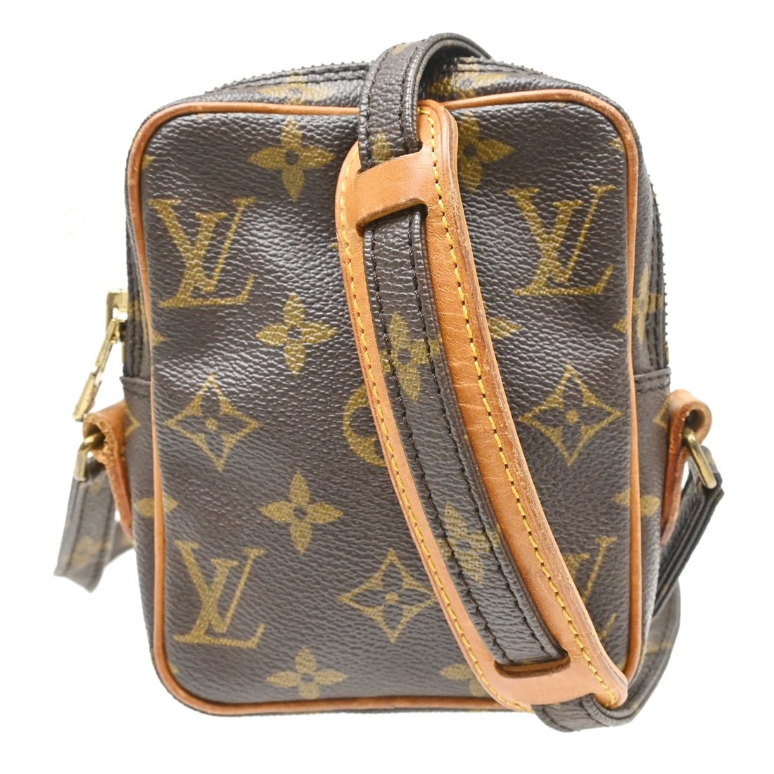 Louis Vuitton Danube Mini Monogram Canvas Crossbody Bag M45268: Louis Vuitton Danube Mini Monogram Canvas Crossbody Bag M45268 Vintage Louis Vuitton Mini Danube shoulder bag in brown Monogram canvas with leather trim. This compact crossbody style features a zip cl