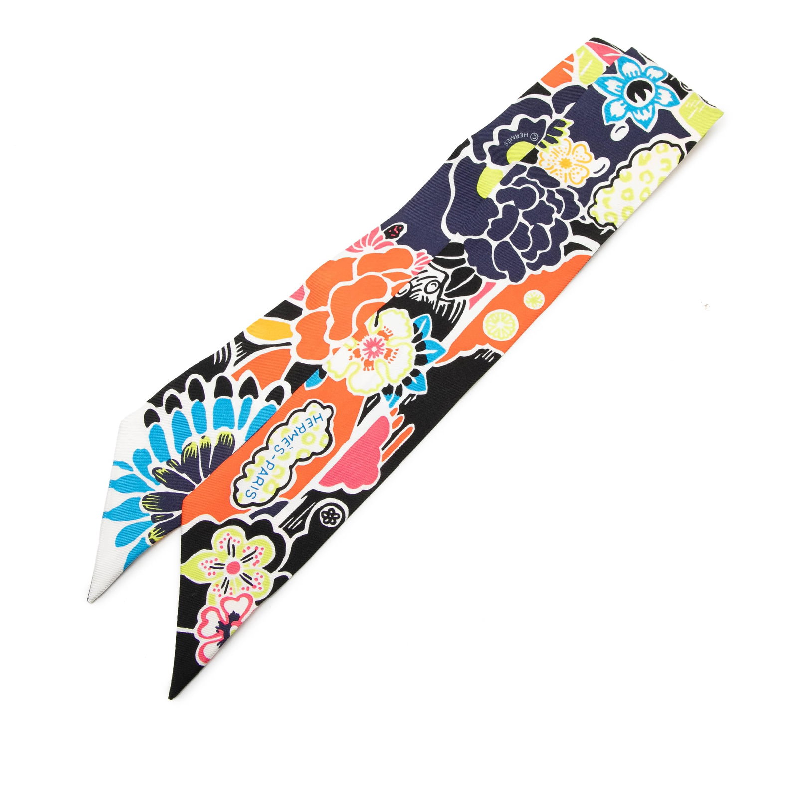 Hermes Bingata Twilly Silk Scarf Black: Hermes Bingata Twilly Silk Scarf Black Hermes Bingata Twilly scarf crafted in silk with a black Bingata print design. Made in France, this accessory includes the original box and is noted in Condition