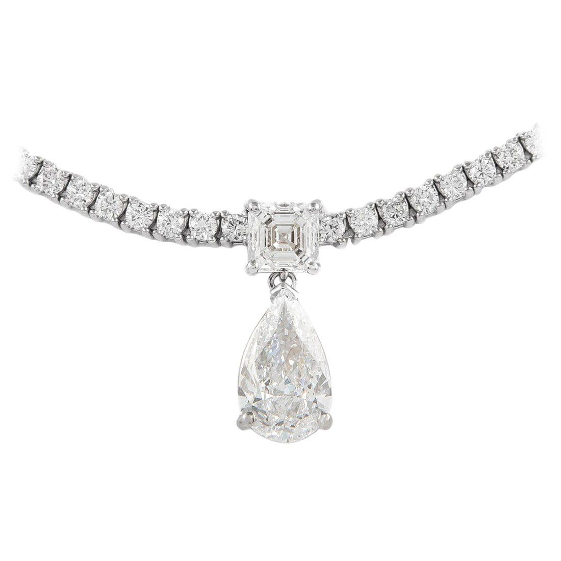 6.33ct GIA Diamond Tennis Necklace 18k White Gold: 6.33ct GIA Diamond Tennis Necklace 18k White Gold This exquisite tennis necklace features a stunning array of diamonds set in luxurious 18k white gold. With a total diamond weight of 6.33 carats, this