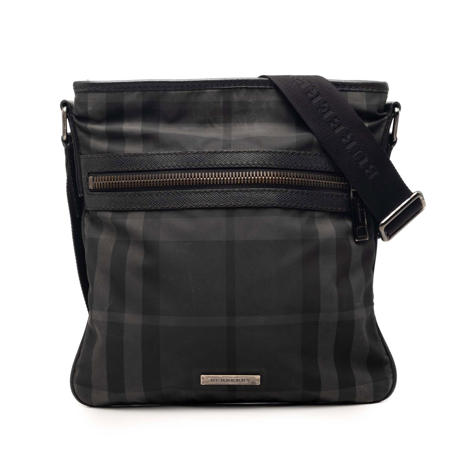 Burberry Smoke Check nylon crossbody bag: Burberry Smoke Check nylon crossbody bag This Burberry Smoke Check Nylon Crossbody bag is crafted from durable nylon in a gray hue and features the iconic check pattern. Designed with practicality in 