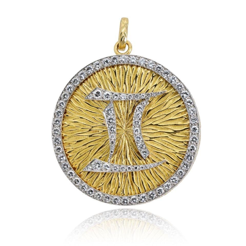 David Webb Gemini Brooch in Platinum and 18K Yellow Gold: David Webb Gemini Brooch in Platinum and 18K Yellow Gold Pre-owned David Webb Gemini brooch crafted in platinum and 18K yellow gold. This piece features an approximate total diamond weight of 5 cts. S