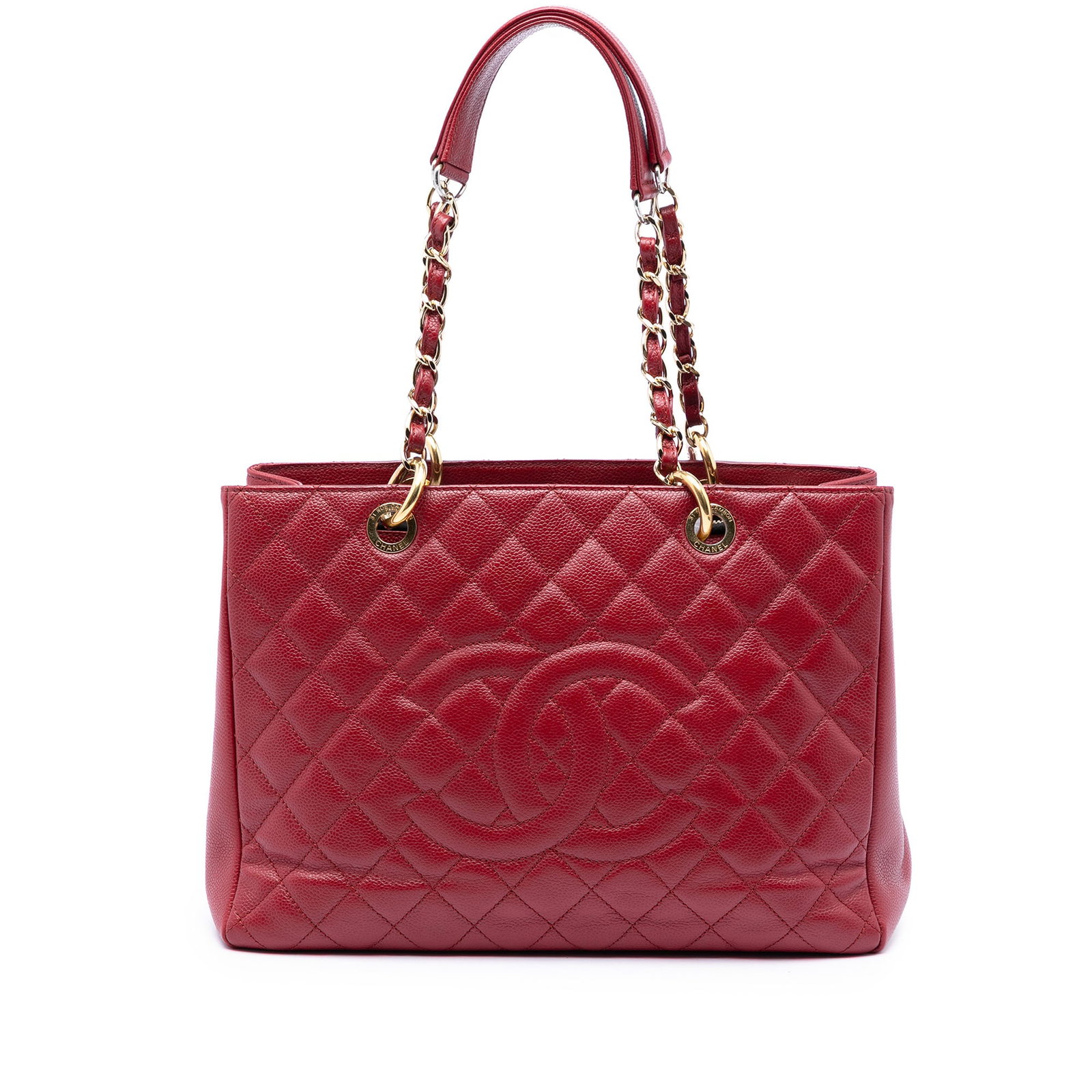 Chanel GST quilted caviar leather tote bag in red: Chanel GST quilted caviar leather tote bag in red This Chanel Grand Shopping Tote is crafted in red quilted caviar leather and features leather-woven chain straps, an exterior back slip pocket, an ope