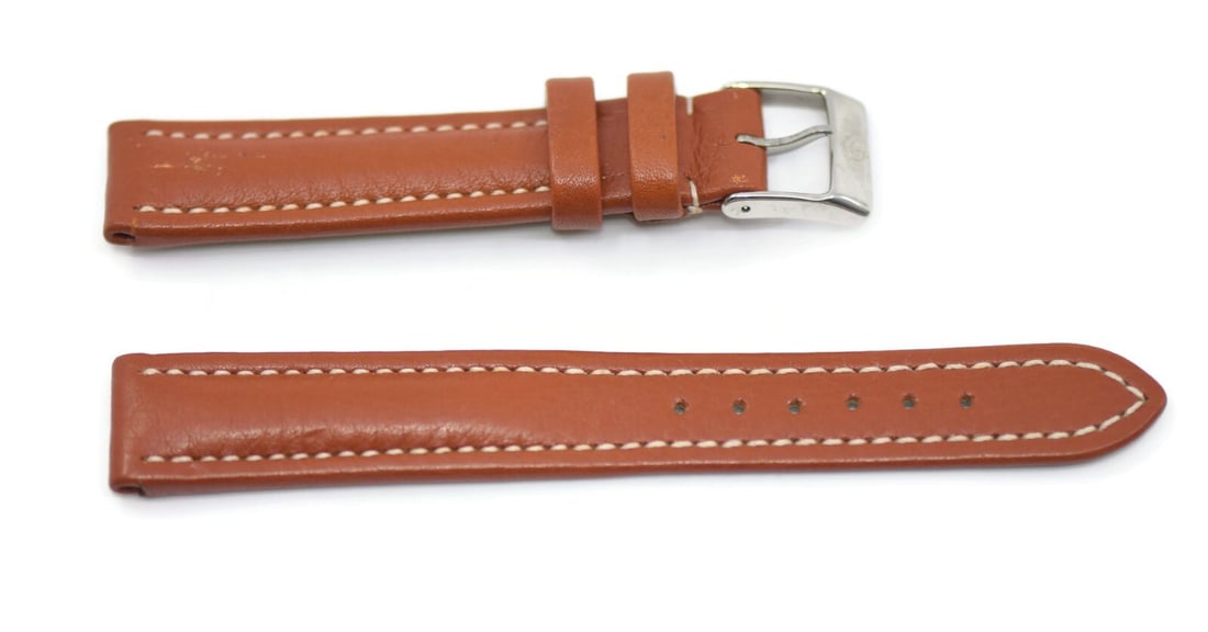 Authentic Breitling Brown Leather Watch Strap 15mm: Authentic Breitling Brown Leather Watch Strap 15mm Enhance your timepiece with this authentic Breitling brown leather wristwatch band. Crafted from high-quality leather, this strap offers a classic lo