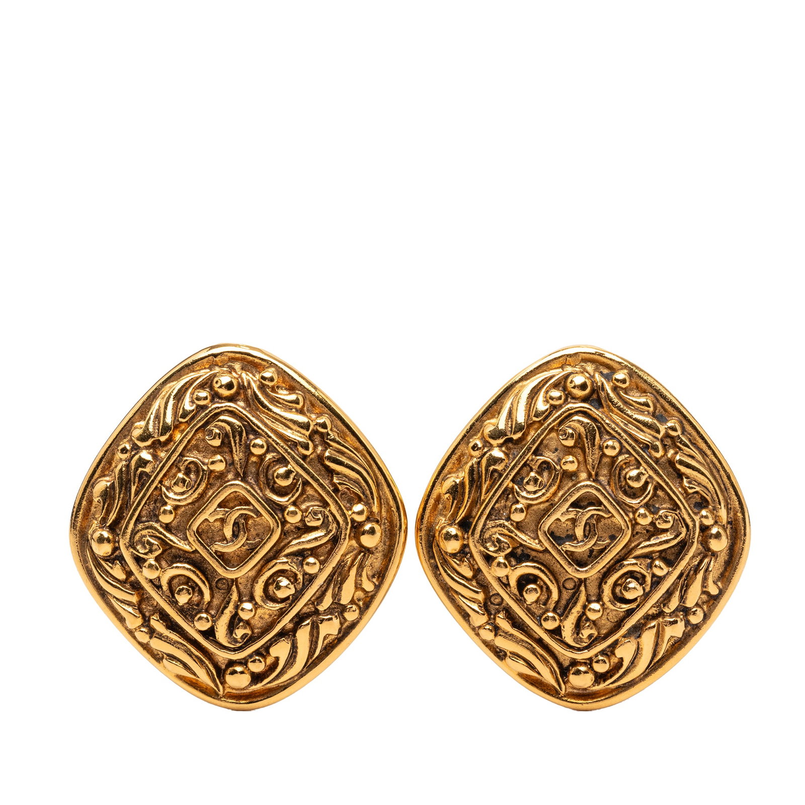 Chanel CC Clip On Earrings Gold Plated Metal with Box: Chanel CC Clip On Earrings Gold Plated Metal with Box Clip-on earrings with a CC motif in gold plated metal. This costume jewelry piece includes the original box and shows visible wear consistent with