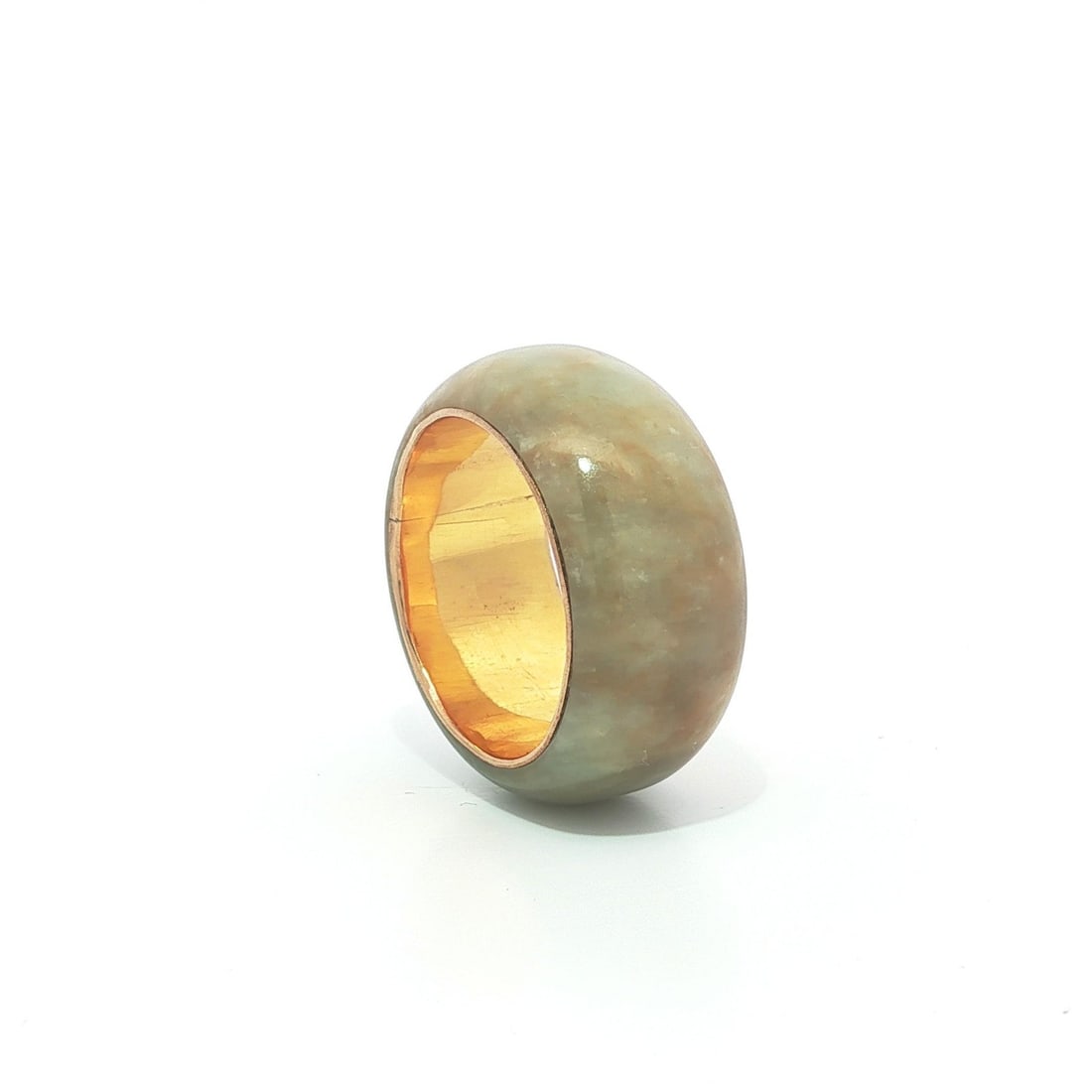 Wide Jade Eternity Band in 14k Yellow Gold Size 5.5 Vintage: Wide Jade Eternity Band in 14k Yellow Gold Size 5.5 Vintage This vintage eternity band ring features a wide, custom-cut mottled green jade stone set in solid 14k yellow gold. Designed for women, the r