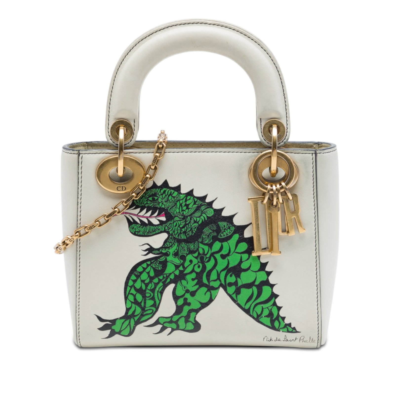 Dior Lady Dior Mini Satchel Niki de Saint Phalle Dragon Calfskin: Dior Lady Dior Mini Satchel Niki de Saint Phalle Dragon Calfskin Limited Edition Niki De Saint Phalle Mini Calfskin Dragon Lady Dior satchel in white leather, made in Italy. It features a printed leat