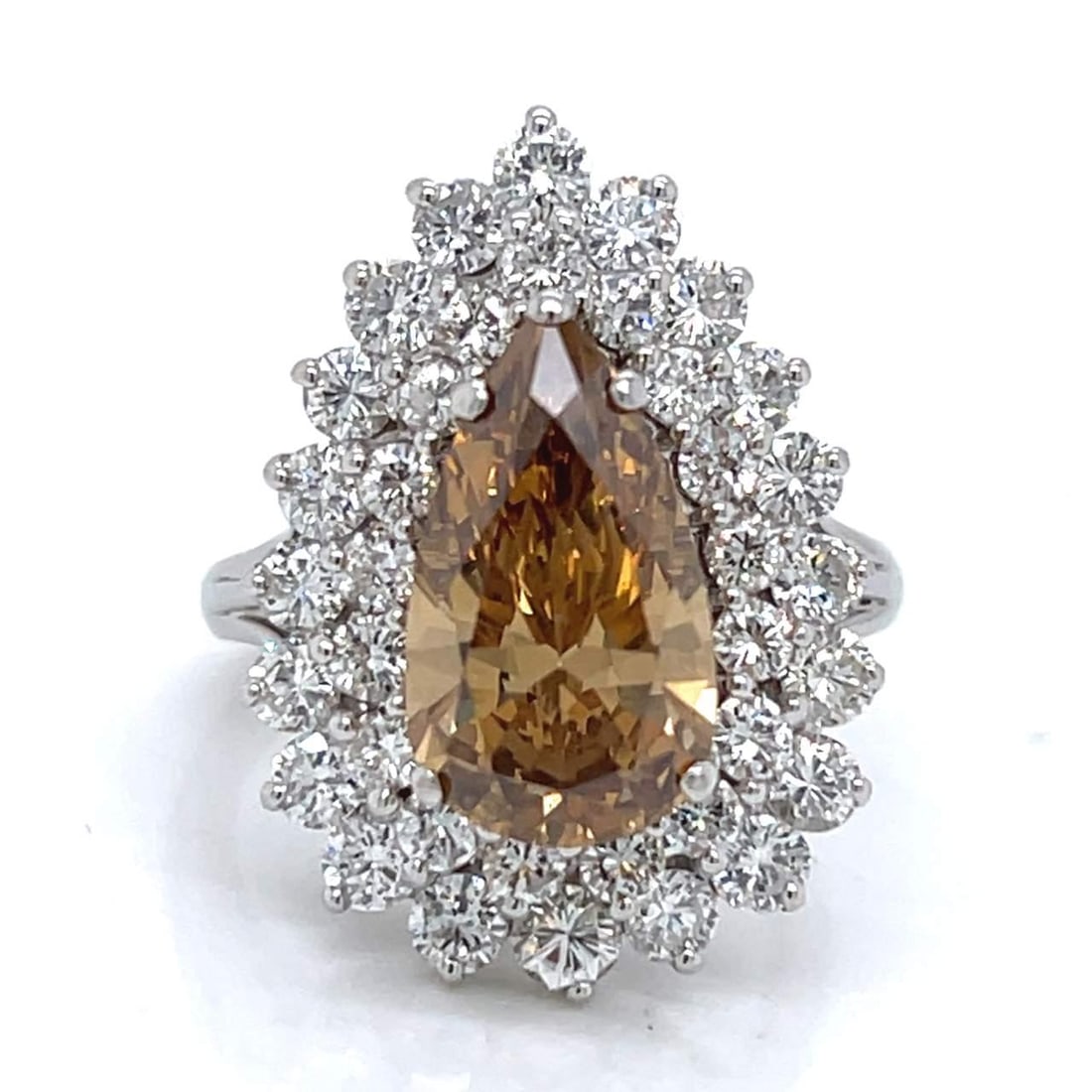14K White Gold 3.01 Ct Fancy Intense Orange-Brown Diamond Ring: 14K White Gold 3.01 Ct Fancy Intense Orange-Brown Diamond Ring This exquisite 14K White Gold ring features a stunning 3.01 Ct. Fancy Intense Orange-Brown Diamond, showcasing exceptional brilliance and