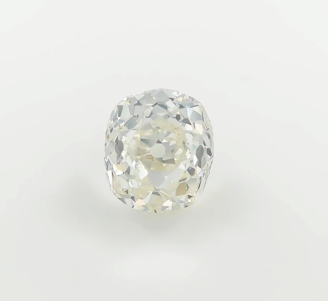 1.40ct Cushion Cut Natural Diamond Near Colorless SI: 1.40ct Cushion Cut Natural Diamond Near Colorless SI Loose natural diamond featuring an Old Mine cut in a cushion shape. This genuine, untreated stone is offered in pre-owned condition and includes a 