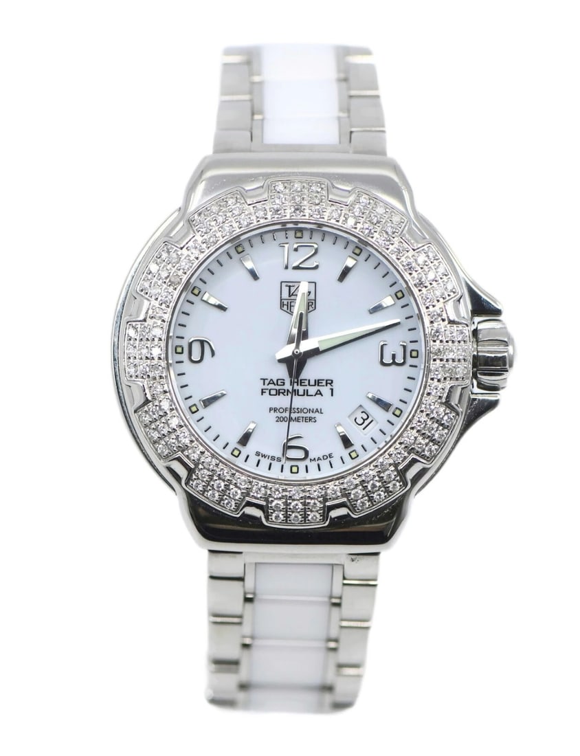 TAG Heuer Formula 1 women s diamond bezel watch WAC1215: TAG Heuer Formula 1 women s diamond bezel watch WAC1215 This TAG Heuer Formula 1 Diamond Ceramic Stainless Steel Watch (reference WAC1215) is a sport-style wristwatch designed for women. Featuring a 3