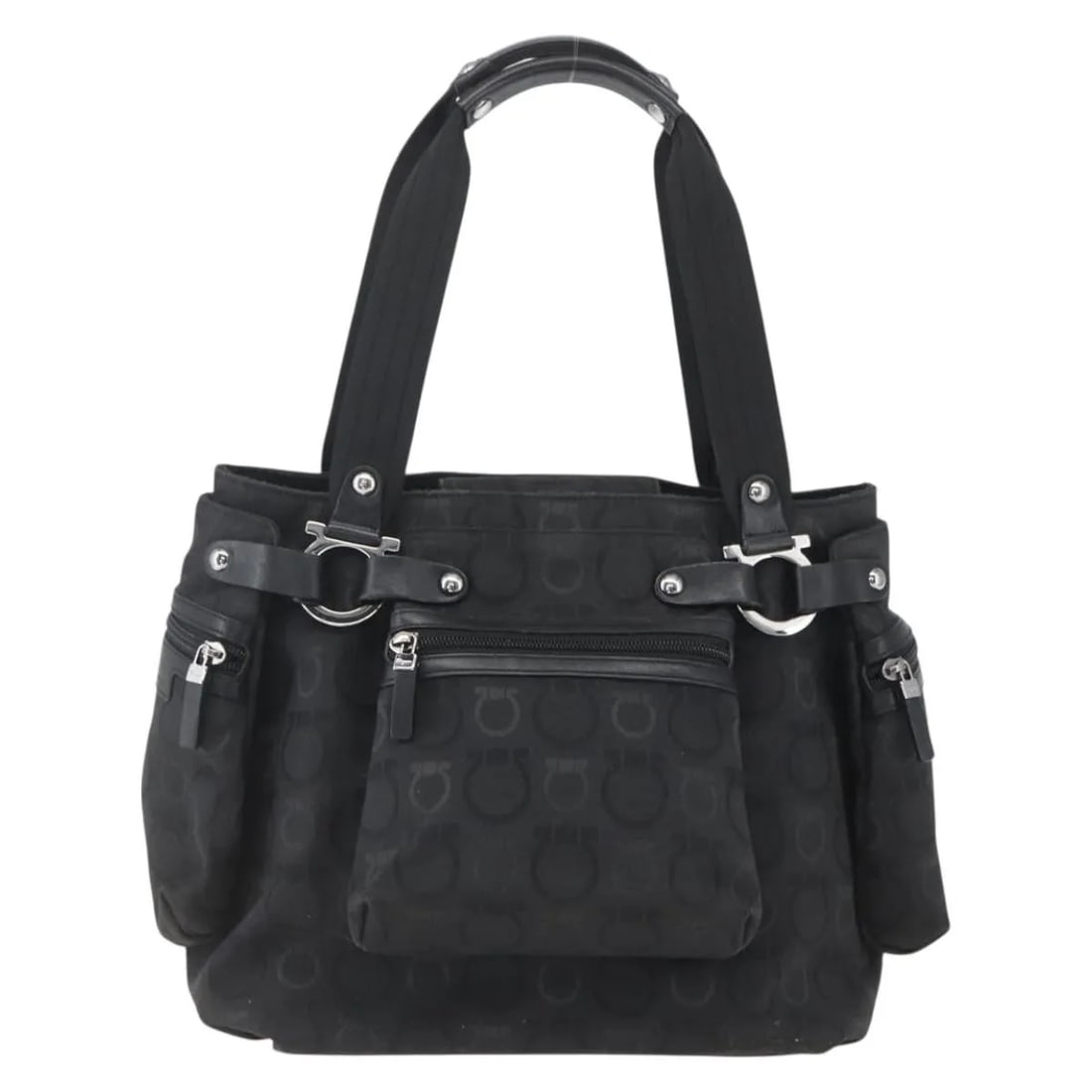 Salvatore Ferragamo Gancini Black Nylon Tote Bag 37x27x18cm: Salvatore Ferragamo Gancini Black Nylon Tote Bag 37x27x18cm This Salvatore Ferragamo Gancini Tote for women features a black nylon exterior with leather accents and metal fittings. The tote shows slig