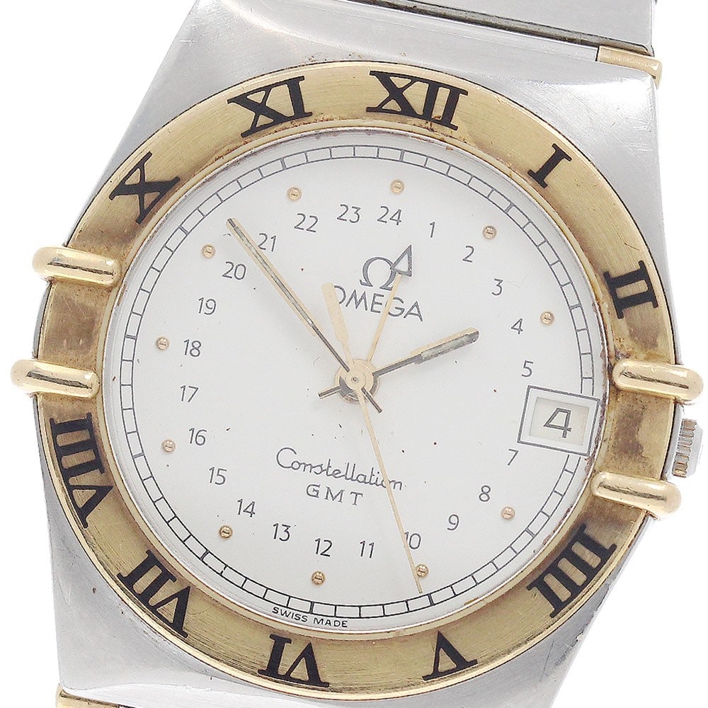 Omega Constellation Quartz GMT Date Mens Wristwatch YG Bezel: Omega Constellation Quartz GMT Date Mens Wristwatch YG Bezel This OMEGA Constellation men's wristwatch features a yellow gold bezel and half bar design. The watch is crafted from stainless steel and y