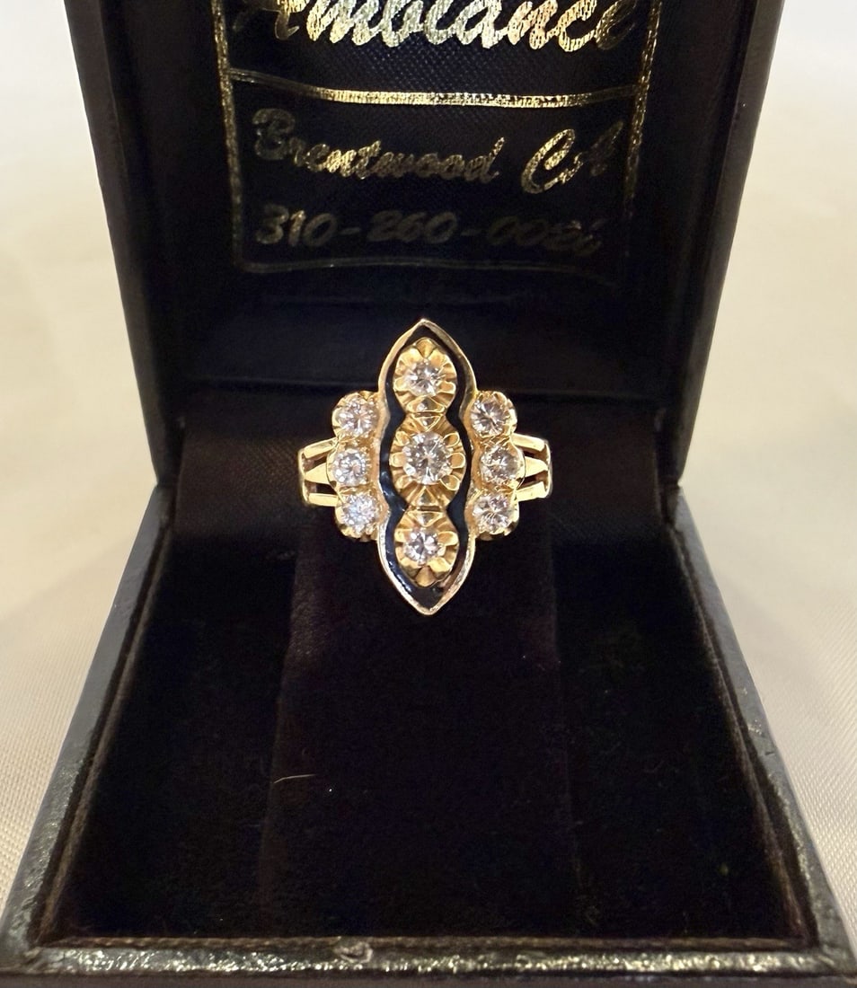 Enameled 14k Yellow Gold Diamond Ring with Nine Stones Size 3.5: Enameled 14k Yellow Gold Diamond Ring with Nine Stones Size 3.5 This is a 14k yellow gold ring featuring enamel detailing and nine diamonds. The ring is a US size 3.5 and is fully signed and hallmarke