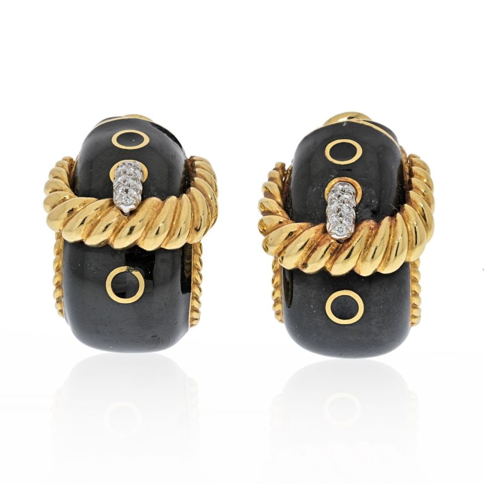 David Webb Bold Gold Black Enamel Diamond Clip Earrings: David Webb Bold Gold Black Enamel Diamond Clip Earrings These stunning earrings by David Webb feature a large and bold signature buckle design, crafted in a luxurious combination of platinum and 18K y