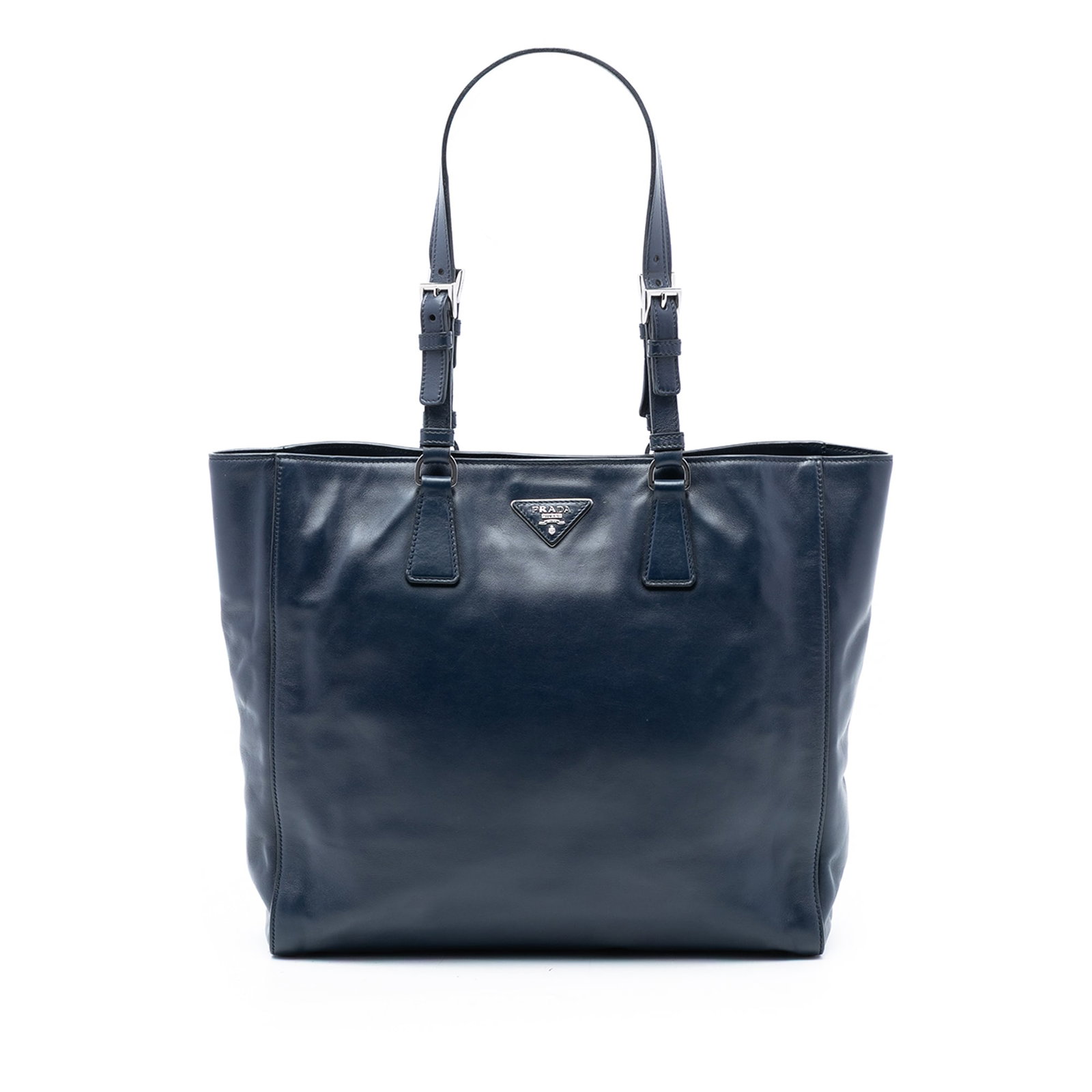 Blue Prada Soft Calf Leather Tote Bag with Adjustable Straps: Blue Prada Soft Calf Leather Tote Bag with Adjustable Straps This Prada Soft Calf Tote is crafted from blue leather and features adjustable flat leather straps, an open top with a magnetic snap button