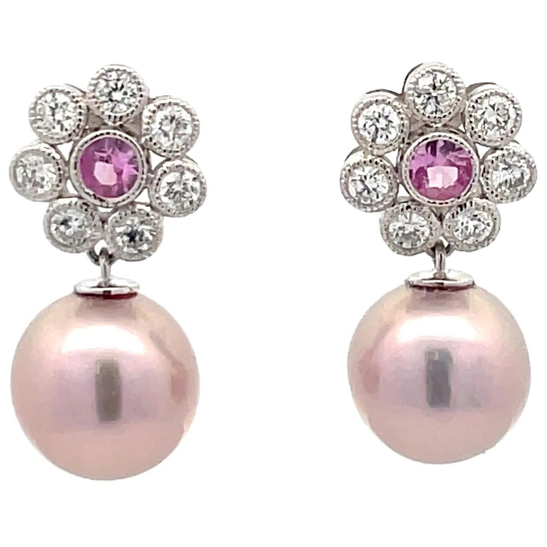 Harbor Diamonds 14k White Gold Floral Drop Earrings with Pink Sapphire and Pearl: Harbor Diamonds 14k White Gold Floral Drop Earrings with Pink Sapphire and Pearl These exquisite drop earrings are crafted from 14k White Gold and feature a stunning floral design. Each earring showca