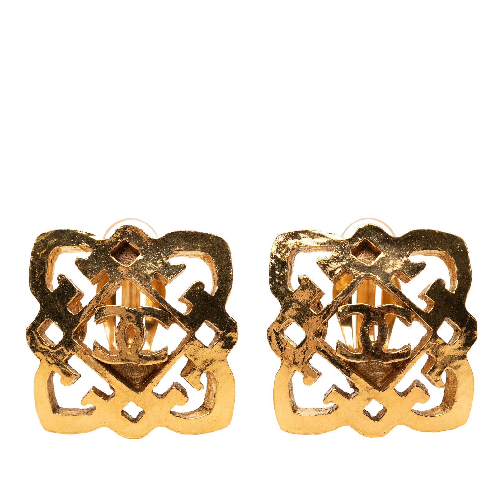 Chanel square clip on gold plated CC earrings: Chanel square clip on gold plated CC earrings These Chanel earrings feature a gold-plated metal construction with the iconic CC logo set in a square design. They are designed with clip-on closures for
