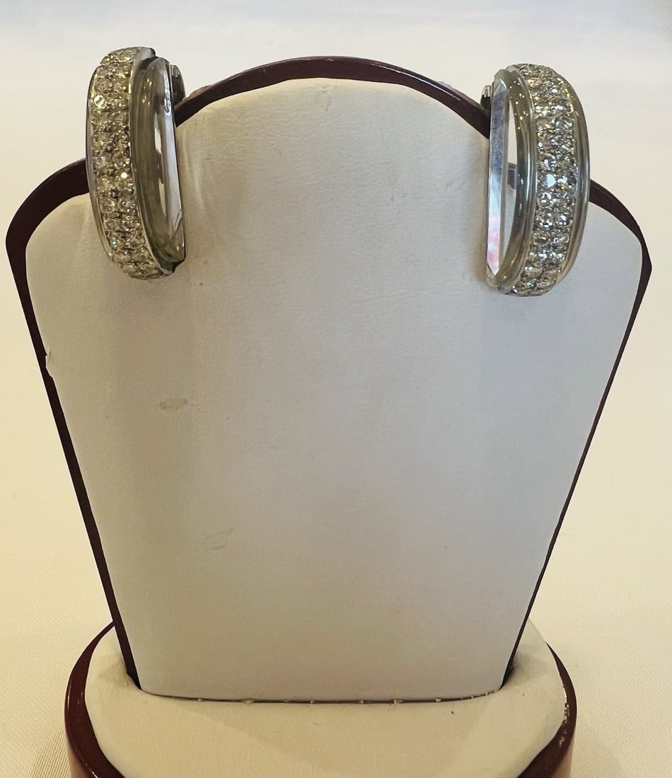 Art Deco French Platinum Diamond Crystal Earrings: Art Deco French Platinum Diamond Crystal Earrings This exquisite pair of Art Deco French earrings is crafted from platinum and features a striking combination of diamonds and rock crystal quartz. Show