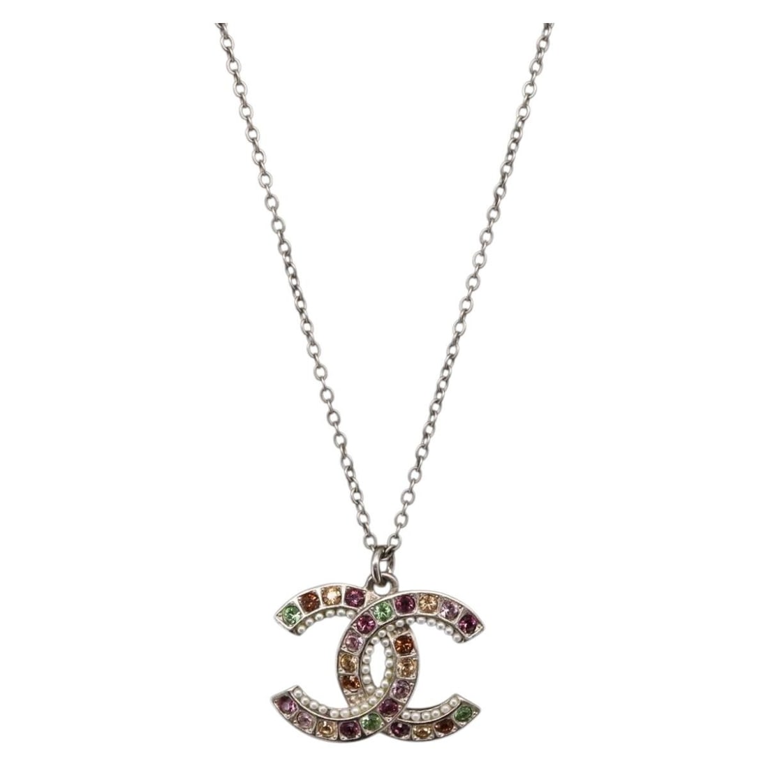 CHANEL Silver Tone Metal CC Pendant Necklace with Box and Dust Bag: CHANEL Silver Tone Metal CC Pendant Necklace with Box and Dust Bag This CHANEL Coco Mark necklace features a silver tone metal construction with the iconic CC logo. The necklace is un-used and in exce