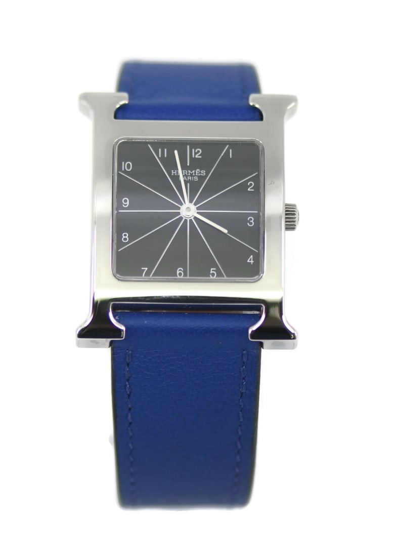 Hermes H Hour Quartz Black Dial Leather Strap Watch 26mm: Hermes H Hour Quartz Black Dial Leather Strap Watch 26mm This Hermes H Hour wristwatch features a classic stainless steel case paired with a black dial, offering a refined and timeless look. Designed 