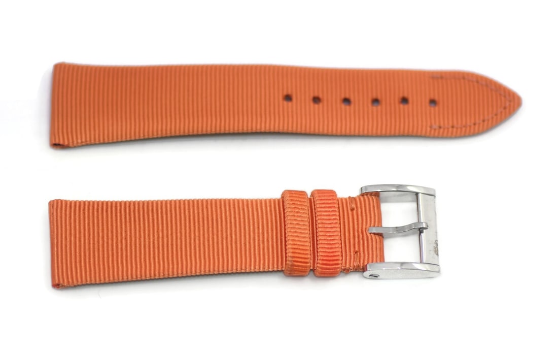 Authentic Bedat & Co Orange Leather Wristwatch Band 19mm: Authentic Bedat & Co Orange Leather Wristwatch Band 19mm Enhance your timepiece with this genuine Bedat & Co. orange leather strap, designed for style and durability. This wristwatch band features a v