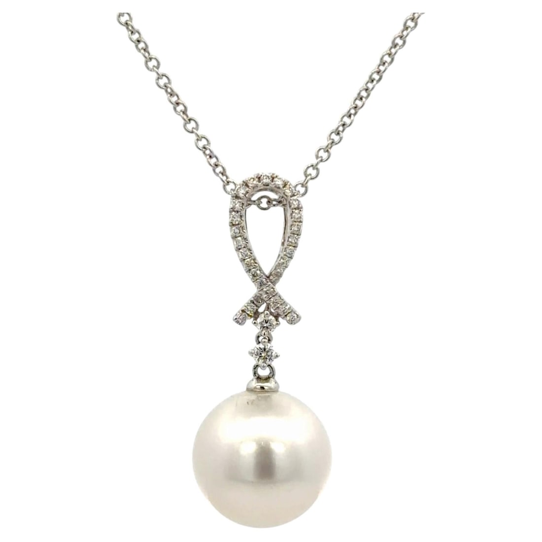 Italian 18K white gold pearl diamond pendant necklace 12mm: Italian 18K white gold pearl diamond pendant necklace 12mm This Italian-made pendant necklace is crafted from 18K white gold and features a luminous 12mm South Sea pearl. The pendant is accented with 