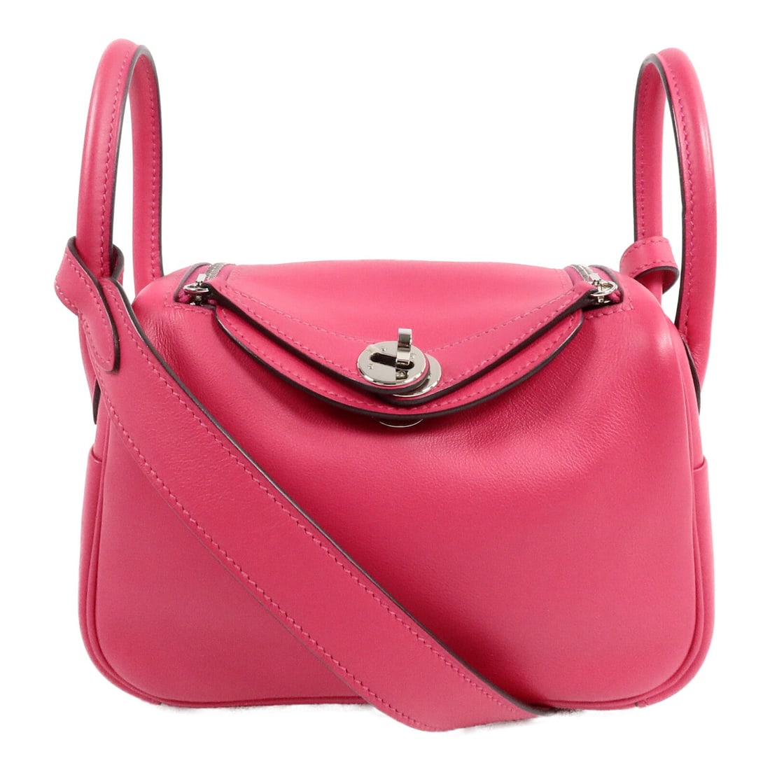 Hermes Mini Lindy Swift Leather 2 Way Bag PHW Rose Mexico Piment: Hermes Mini Lindy Swift Leather 2 Way Bag PHW Rose Mexico Piment Mini Lindy 2 Way Shoulder Bag in Swift leather and calfskin (cowhide) with a Rose Mexico / Piment colorway. It features a fastener clos