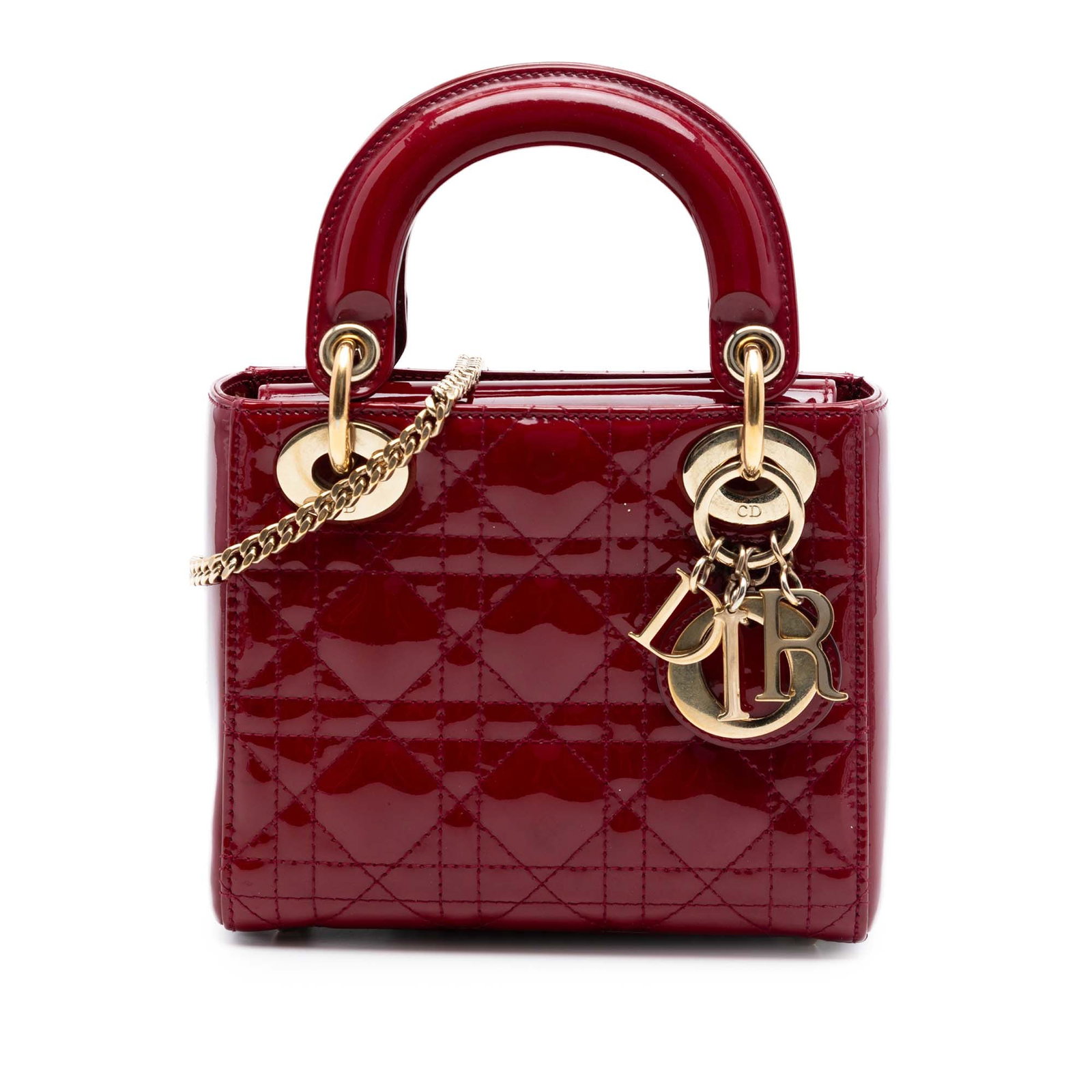 Dior Lady Dior Mini Cannage Patent Leather Bag Red: Dior Lady Dior Mini Cannage Patent Leather Bag Red Mini Lady Dior bag in red patent leather with Cannage quilting. This handbag features flat top handles, a detachable curb chain strap, a flap closure