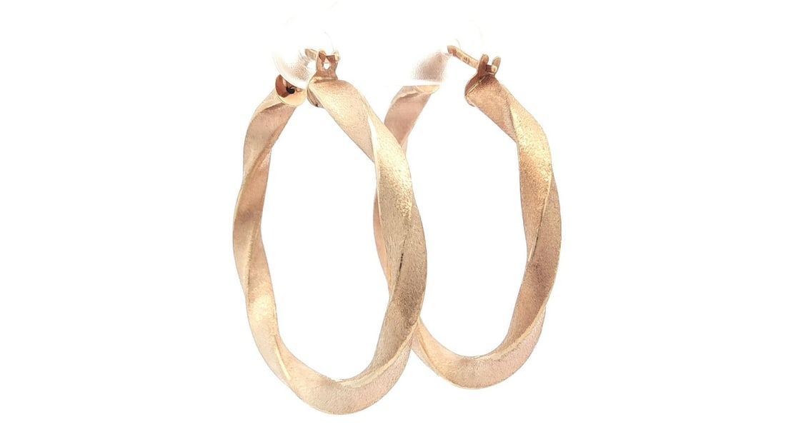 Italian 14k Yellow Gold 38mm Twisted Satin Finish Hoop Earrings: Italian 14k Yellow Gold 38mm Twisted Satin Finish Hoop Earrings Elevate your style with these exquisite Italian 14k Yellow Gold Large Hoop Earrings. Featuring a unique twisted design and a luxurious s