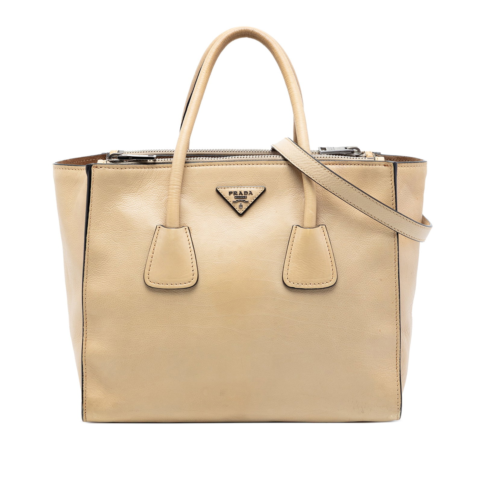 Prada Beige Glace Calf Leather Twin Pocket Satchel: Prada Beige Glace Calf Leather Twin Pocket Satchel This Prada Glace Calf Twin Pocket Double Handle Satchel is crafted from beige calf leather and features rolled leather handles, an open top with magn