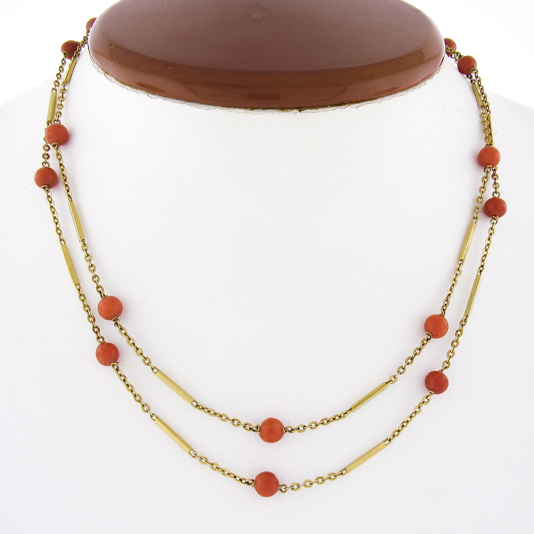 Vintage 18k Yellow Gold Coral Bead 30 Inch Necklace: Vintage 18k Yellow Gold Coral Bead 30 Inch Necklace This exquisite vintage necklace features a stunning combination of 18k yellow gold and natural coral beads, creating a beautiful accessory suitable 