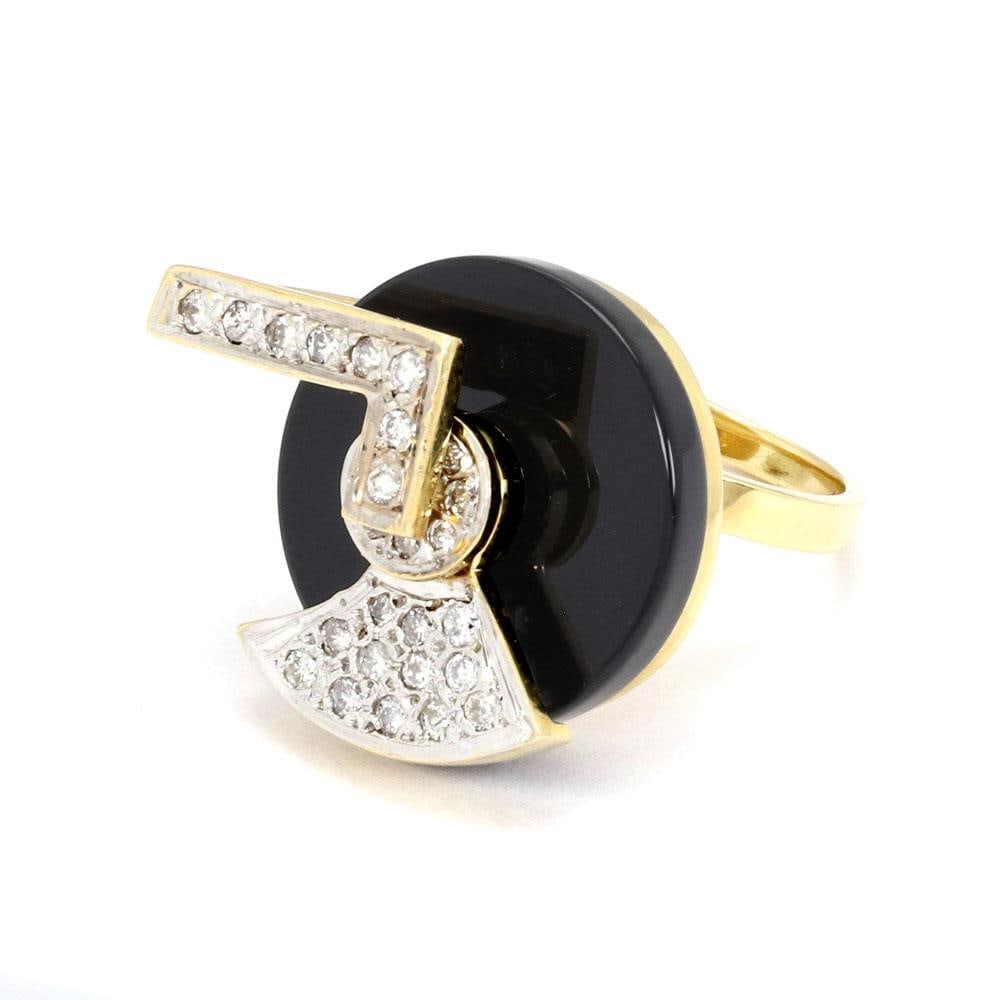 18k Two-Tone Gold Diamond Onyx Spinner Ring Size 7: 18k Two-Tone Gold Diamond Onyx Spinner Ring Size 7 This unique 18k two-tone gold ring showcases a captivating design. Crafted from both yellow and white gold with a polished finish, it features a roun