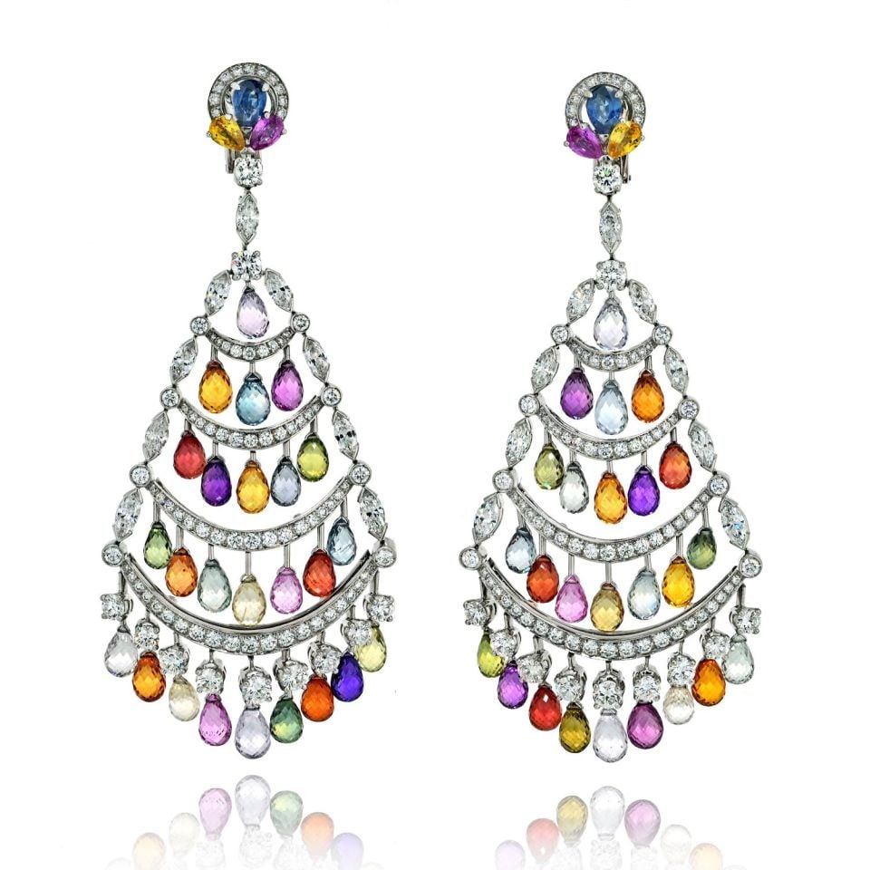 Graff 18K White Gold Multicolor Sapphire Diamond Chandelier Earrings: Graff 18K White Gold Multicolor Sapphire Diamond Chandelier Earrings Introducing stunning chandelier earrings crafted from luxurious 18K white gold. These exquisite earrings feature a captivating desi
