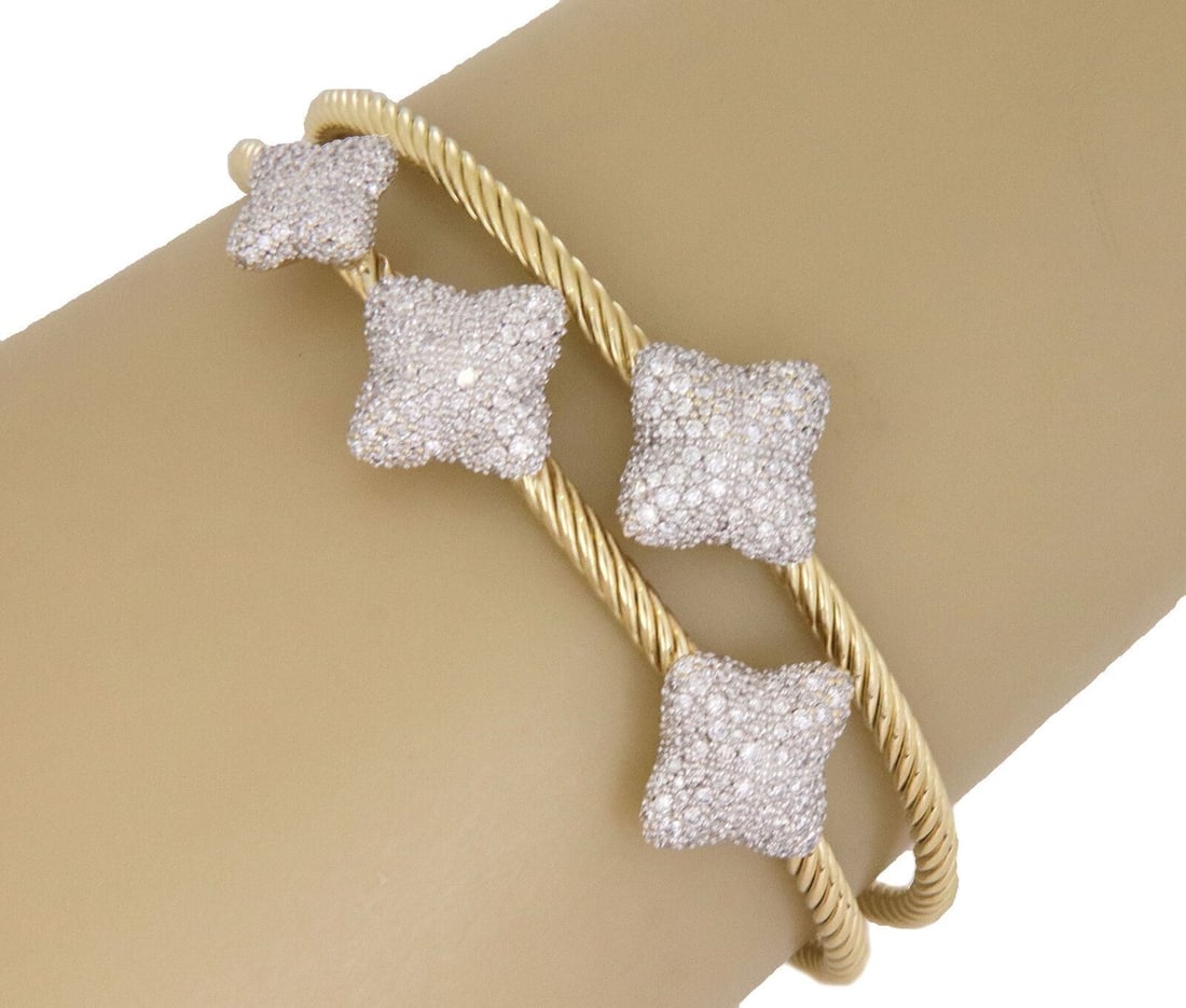 David Yurman Quatrefoil Diamond Double Cable Cuff Bracelet 18k Gold: David Yurman Quatrefoil Diamond Double Cable Cuff Bracelet 18k Gold This David Yurman cuff bracelet features a signature double cable design with a quatrefoil diamond-set centerpiece. Crafted in 18k y