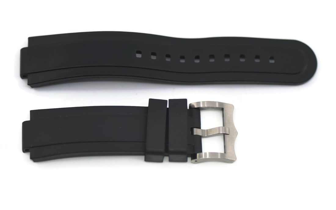 21.5mm Black Rubber Wristwatch Band by Tudor: 21.5mm Black Rubber Wristwatch Band by Tudor This is a pre-owned Tudor black rubber wristwatch band with a strap width of 21.5mm. Made in Switzerland, it is 100% authentic and designed for use with Tu