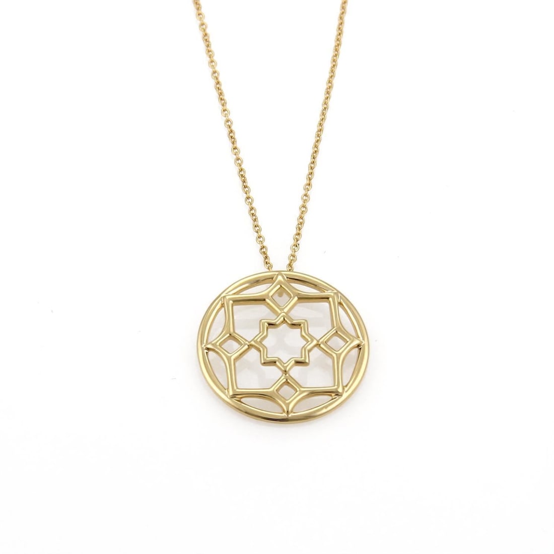 Tiffany Co Paloma Picasso Zellige 18k Gold Pendant Necklace: Tiffany Co Paloma Picasso Zellige 18k Gold Pendant Necklace This pre-owned Tiffany & Co. Paloma Picasso Zellige small pendant necklace is crafted in solid 18k yellow gold and features a circular openw