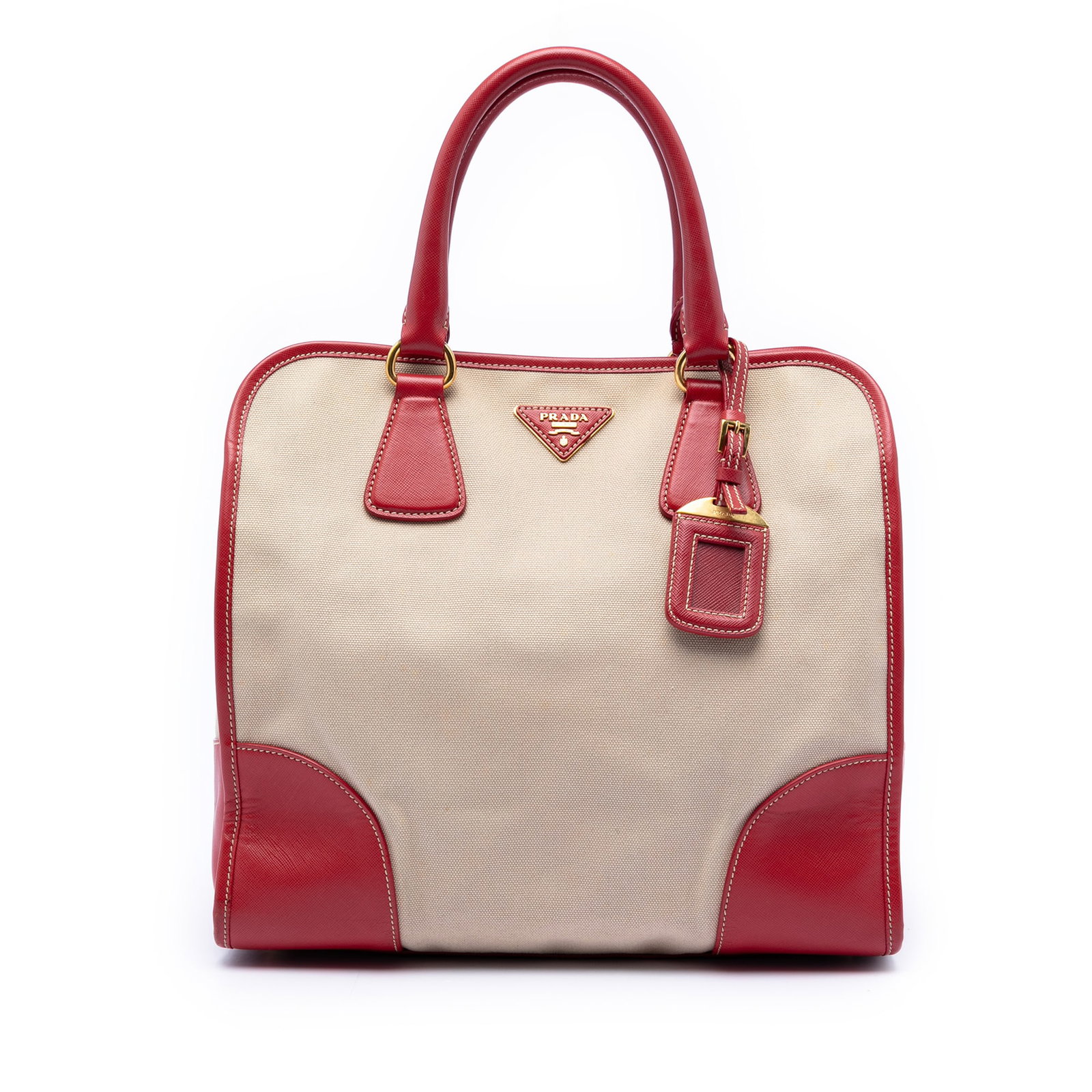 Prada Canapa Beige Canvas Satchel with Saffiano Leather Accents: Prada Canapa Beige Canvas Satchel with Saffiano Leather Accents This Prada Saffiano Trimmed Canvas Canapa Satchel features a canvas body with saffiano leather trim, rolled leather handles, an open top