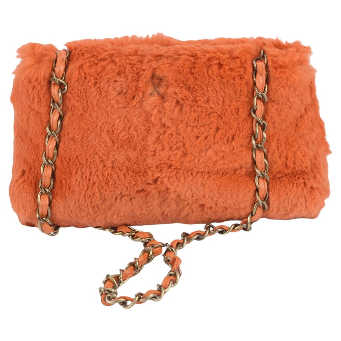 Chanel Orylag Orange Fur Shoulder Bag with Gold-Tone Hardware: Chanel Orylag Orange Fur Shoulder Bag with Gold-Tone Hardware This exquisite Chanel Orylag Fur Shoulder Bag features a stunning orange hue and is crafted from luxurious Orylag fur. The design is accen