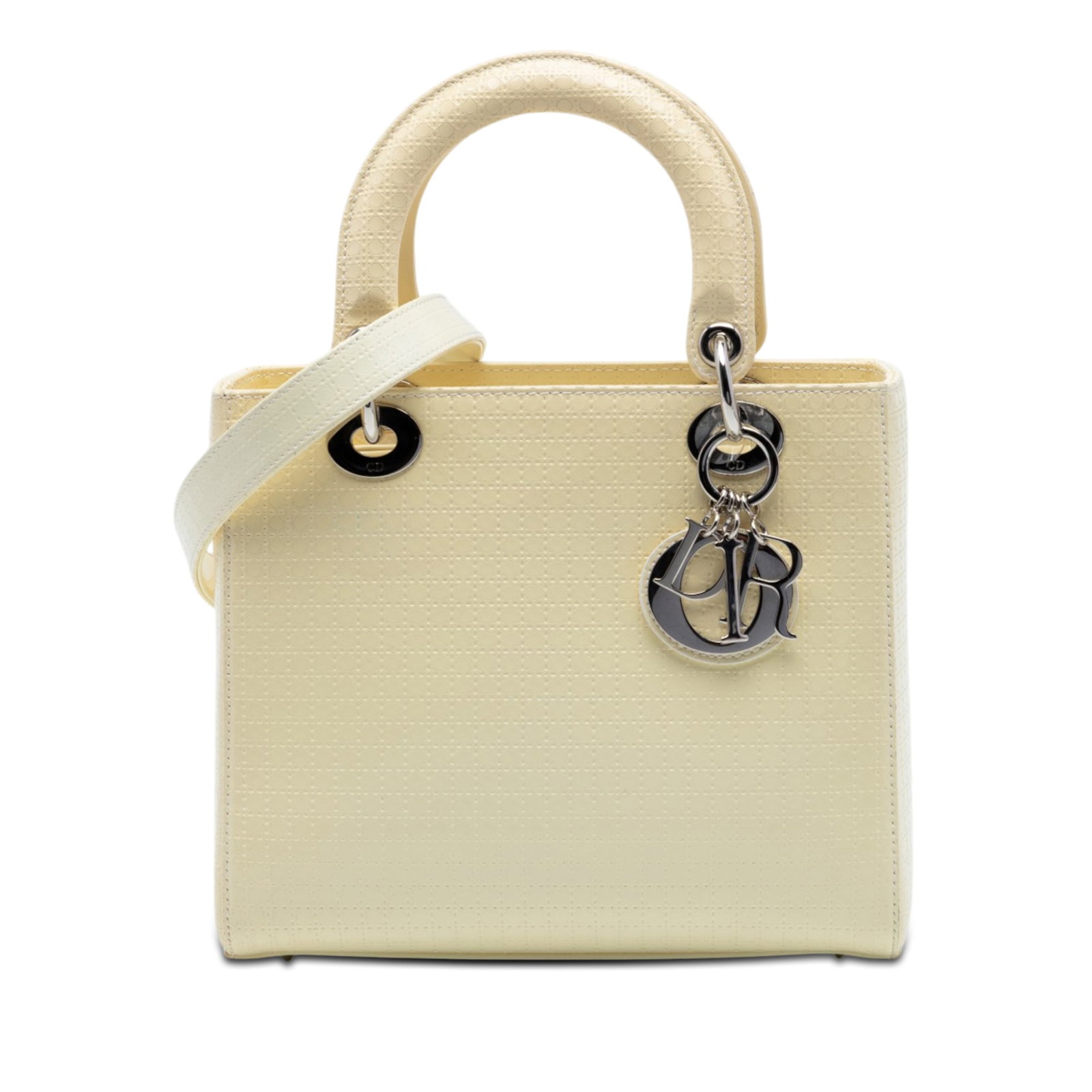 Dior Medium Patent Microcannage Lady Dior Bag White Leather: Dior Medium Patent Microcannage Lady Dior Bag White Leather This Medium Patent Microcannage Lady Dior bag showcases a quilted patent leather exterior in white, complemented by flat leather handles and