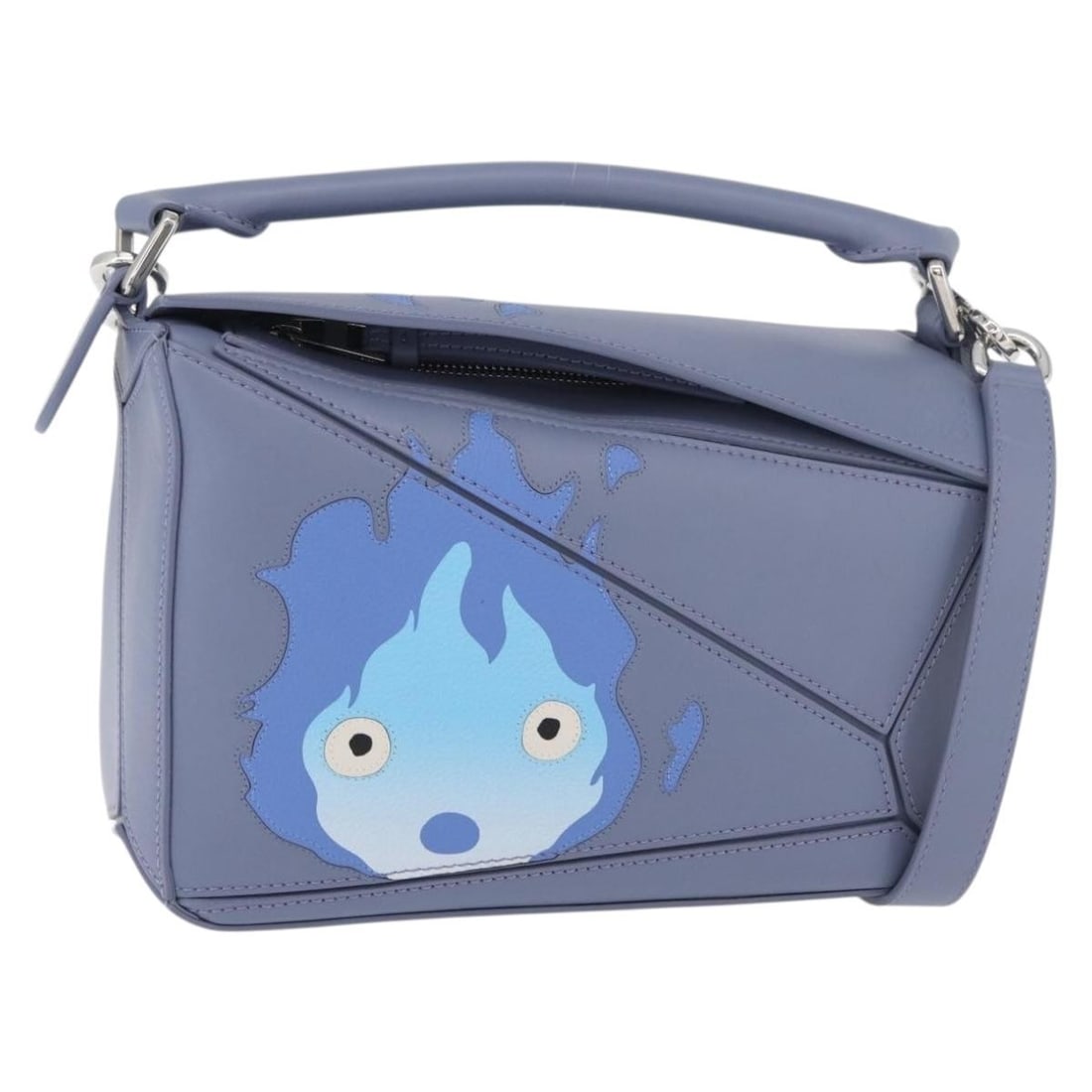 LOEWE Puzzle Bag Howl's Moving Castle Calcifer 2way Light Blue Leather: LOEWE Puzzle Bag Howl's Moving Castle Calcifer 2way Light Blue Leather This LOEWE Puzzle Bag is a women's handbag from the LOEWE x Ghibli Howl's Moving Castle collaboration, featuring Calcifer. It is 