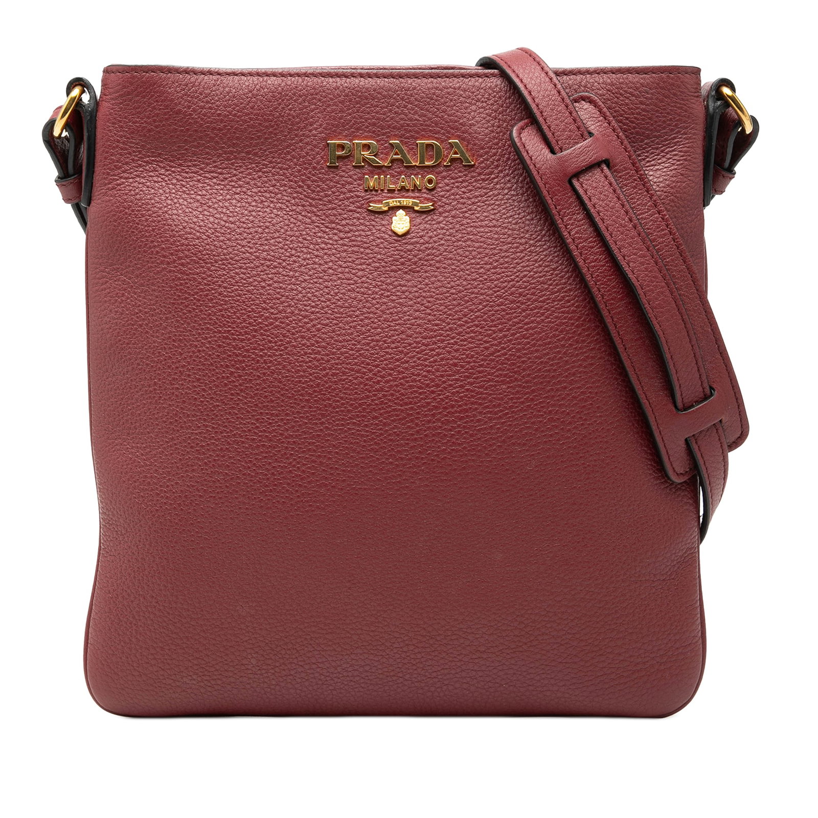 Prada Vitello Daino leather crossbody bag red: Prada Vitello Daino leather crossbody bag red Prada Vitello Daino Crossbody in red leather with an adjustable flat leather strap, top zip closure, exterior back zip pocket, and interior slip pocket. M