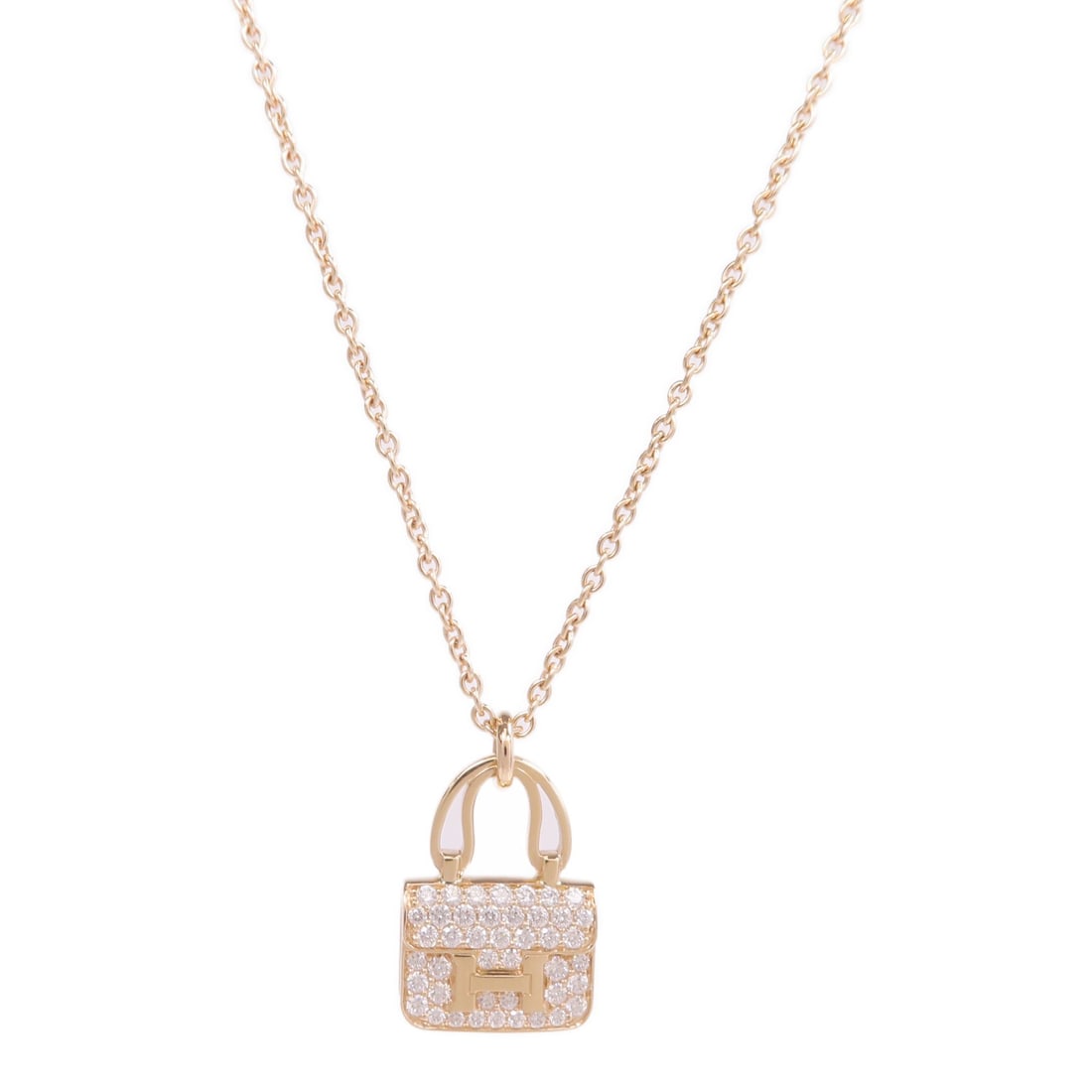 Hermes Amulette Constance 18K Rose Gold Diamond Necklace: Hermes Amulette Constance 18K Rose Gold Diamond Necklace Hermes Amulette Constance Necklace in 18K pink gold with diamond accents. The necklace is a women's regular-size piece from France, presented i