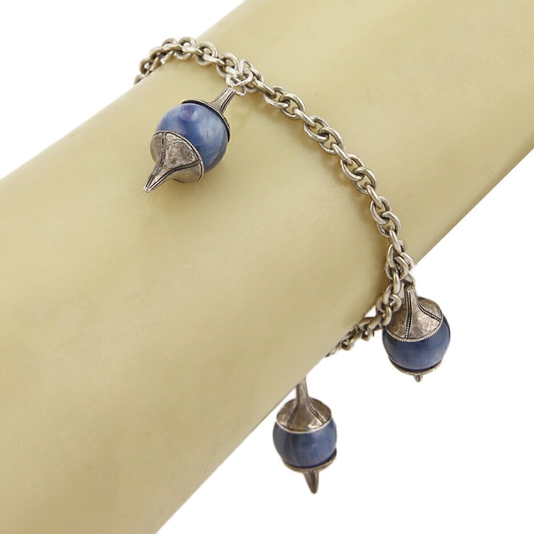 Gurhan Gatsby Toggle Bracelet Sterling Silver 24k Gold Kyanite Charms: Gurhan Gatsby Toggle Bracelet Sterling Silver 24k Gold Kyanite Charms Sterling silver bracelet from the Gatsby collection, crafted with 24k yellow gold accents and five kyanite charms. It features a b