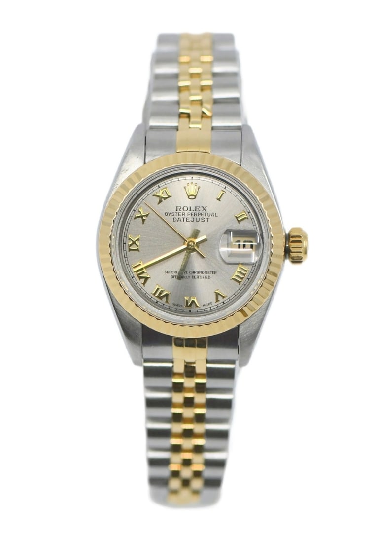 Rolex Datejust Ref 79173 Womens 26mm Automatic Wristwatch Box Papers: Rolex Datejust Ref 79173 Womens 26mm Automatic Wristwatch Box Papers Rolex Datejust wristwatch reference 79173 in 18K and stainless steel. It features a round silver dial with date indicator, gold bez