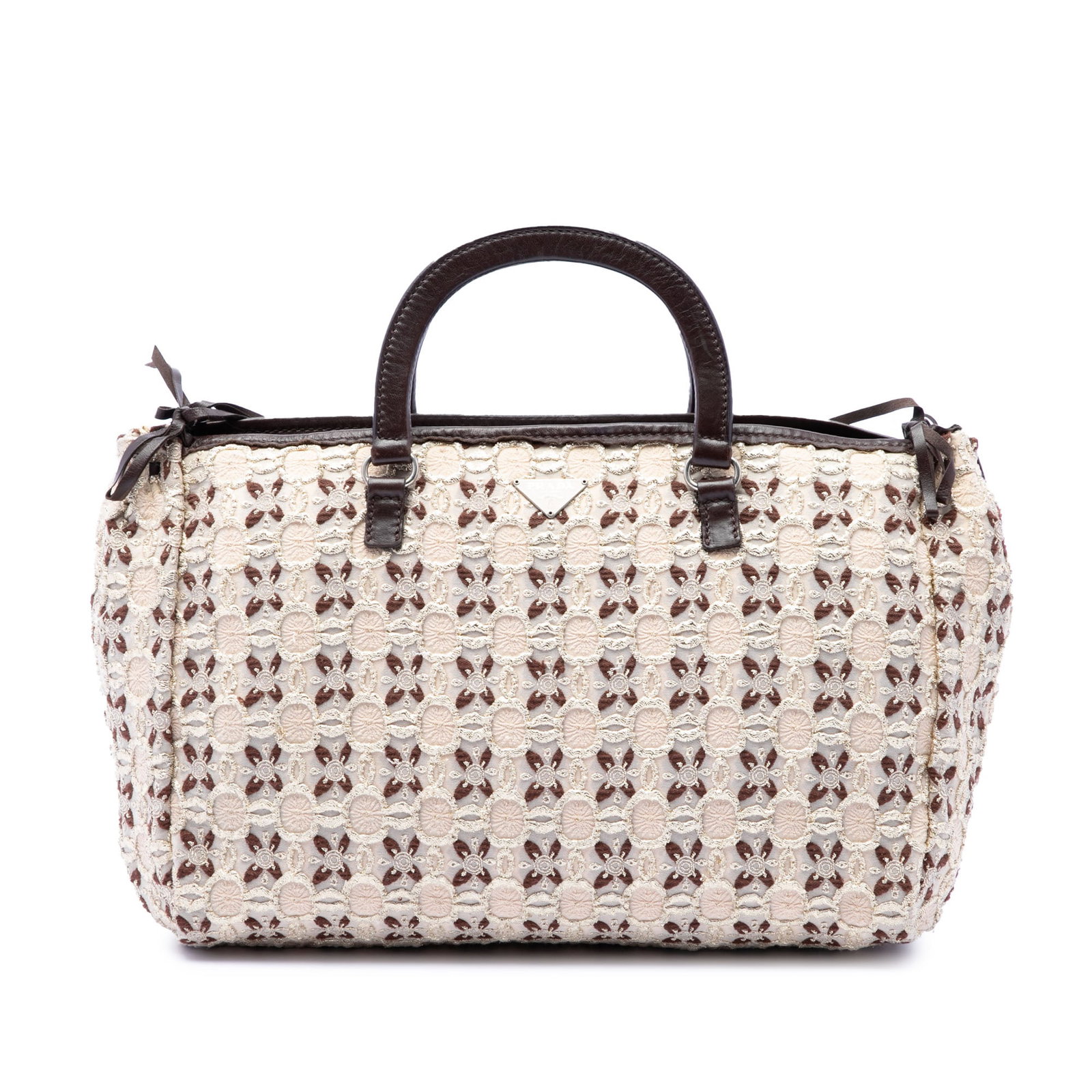 Prada Cloquet Bow Canvas Handbag with Leather Trim: Prada Cloquet Bow Canvas Handbag with Leather Trim Prada Cloquet handle bag crafted with a canvas body, leather trim, flat leather handles, and a top zip closure. The bag is made in Italy and finished