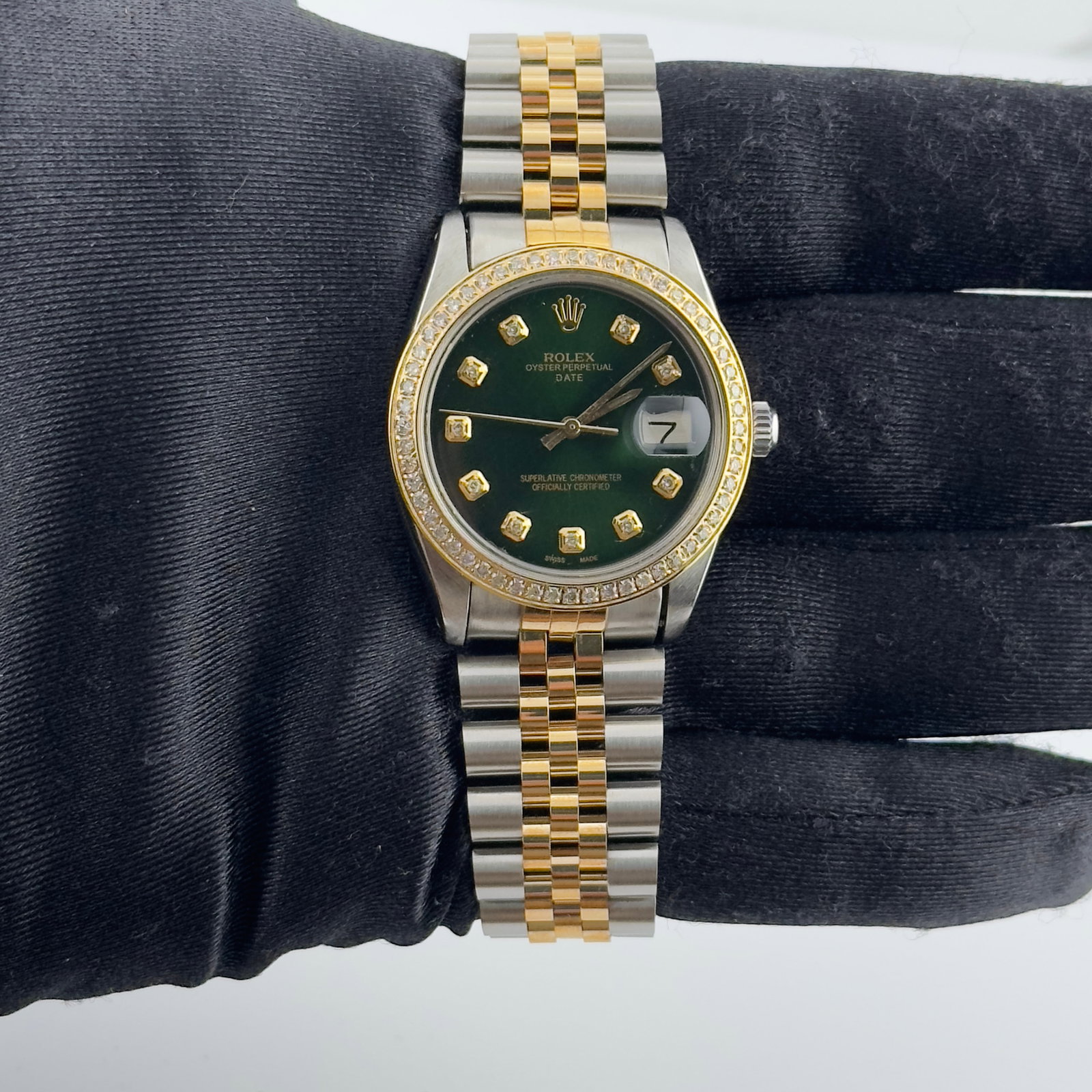 Rolex Date 6694 Green Diamond Dial Aftermarket Jubilee Bracelet: Rolex Date 6694 Green Diamond Dial Aftermarket Jubilee Bracelet This is a Rolex Date watch, reference 6694, featuring an aftermarket green diamond dial and an aftermarket Jubilee bracelet. The watch i