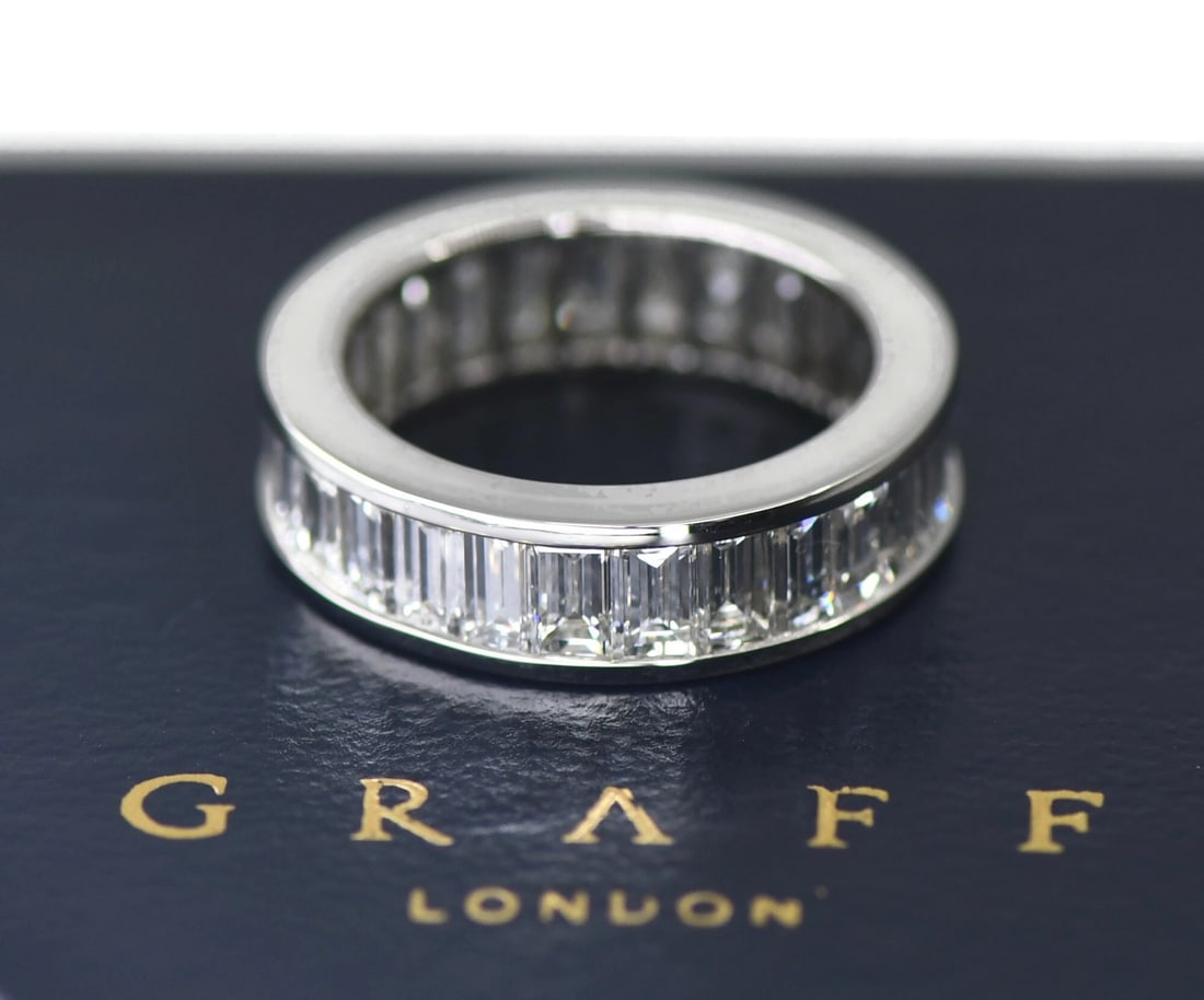 Graff Platinum Eternity Band 4.20 CTW G VS1 Size 5: Graff Platinum Eternity Band 4.20 CTW G VS1 Size 5 This Graff eternity ring features 27 baguette-cut diamonds with a total carat weight of 4.20, graded G/VS1 for color and clarity. Crafted from 950 pl