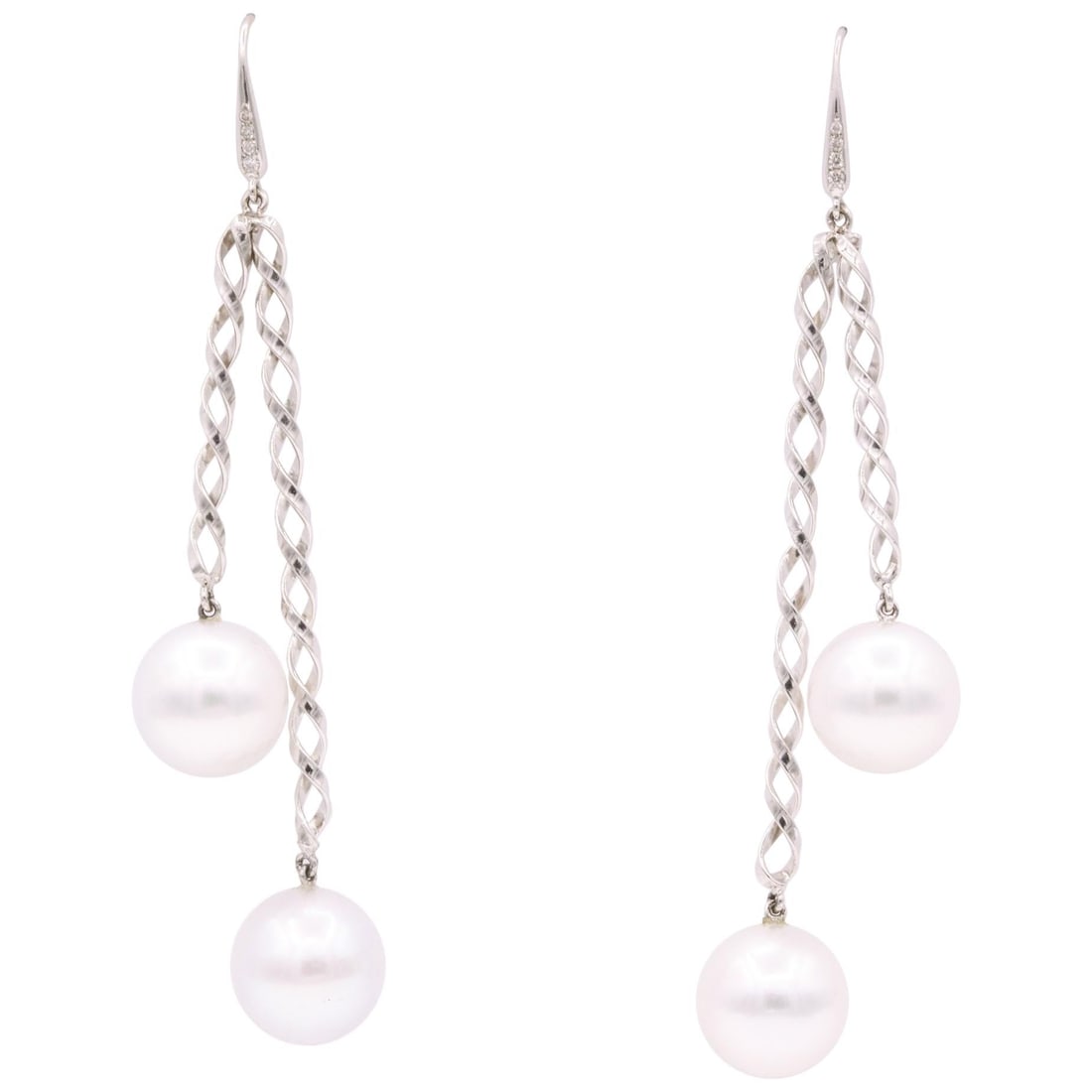 Harbor Diamonds 14K White Gold South Sea Pearl Diamond Drop Earrings: Harbor Diamonds 14K White Gold South Sea Pearl Diamond Drop Earrings Elevate your elegance with these stunning South Sea Pearl Diamond Swirl Drop Earrings. Crafted in 14K white gold, these contemporar