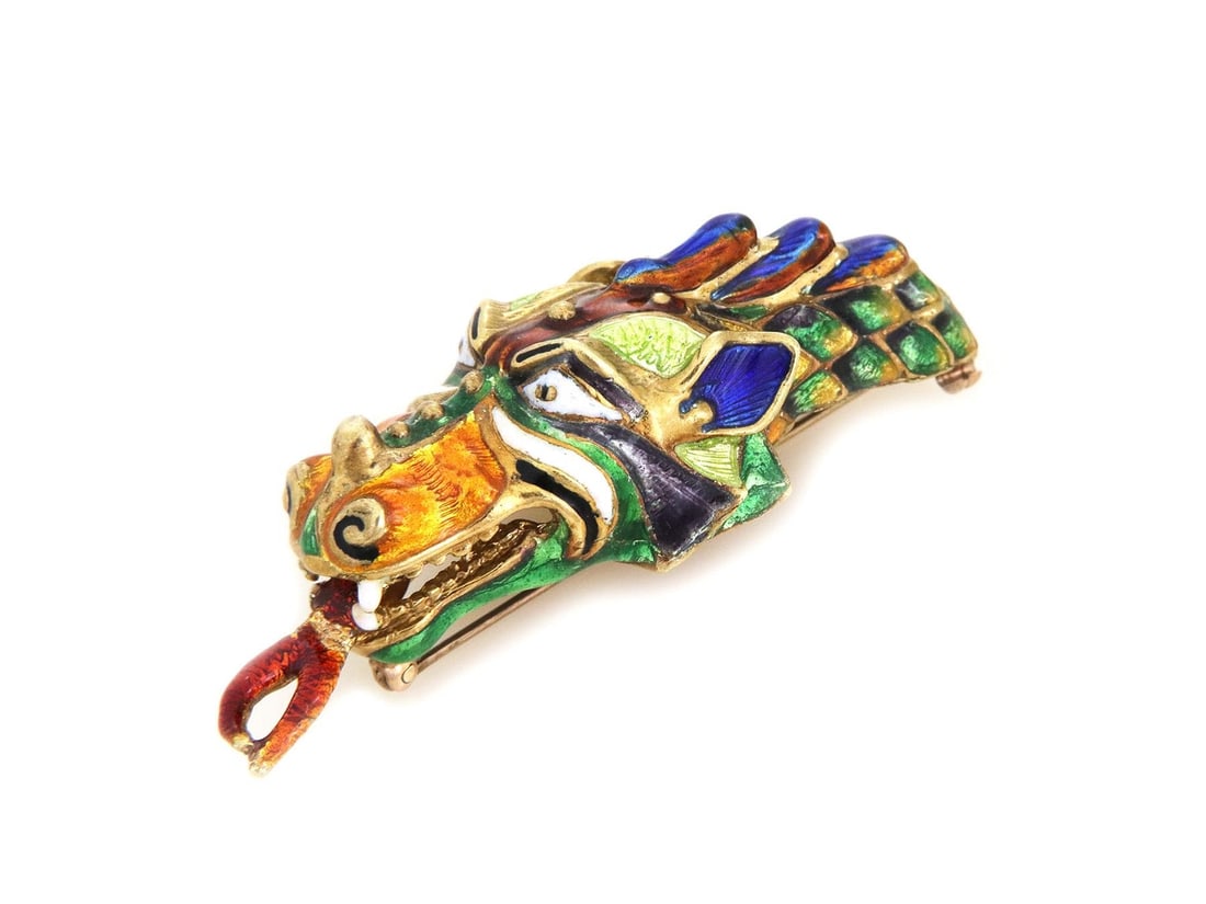 Vibrant 18k Yellow Gold Multi-Color Enamel Dragon Head Brooch: Vibrant 18k Yellow Gold Multi-Color Enamel Dragon Head Brooch This stunning Estate Multi-Color Enamel Dragon Head Brooch is a unique piece of jewelry crafted from 18k yellow gold. The detailed design 