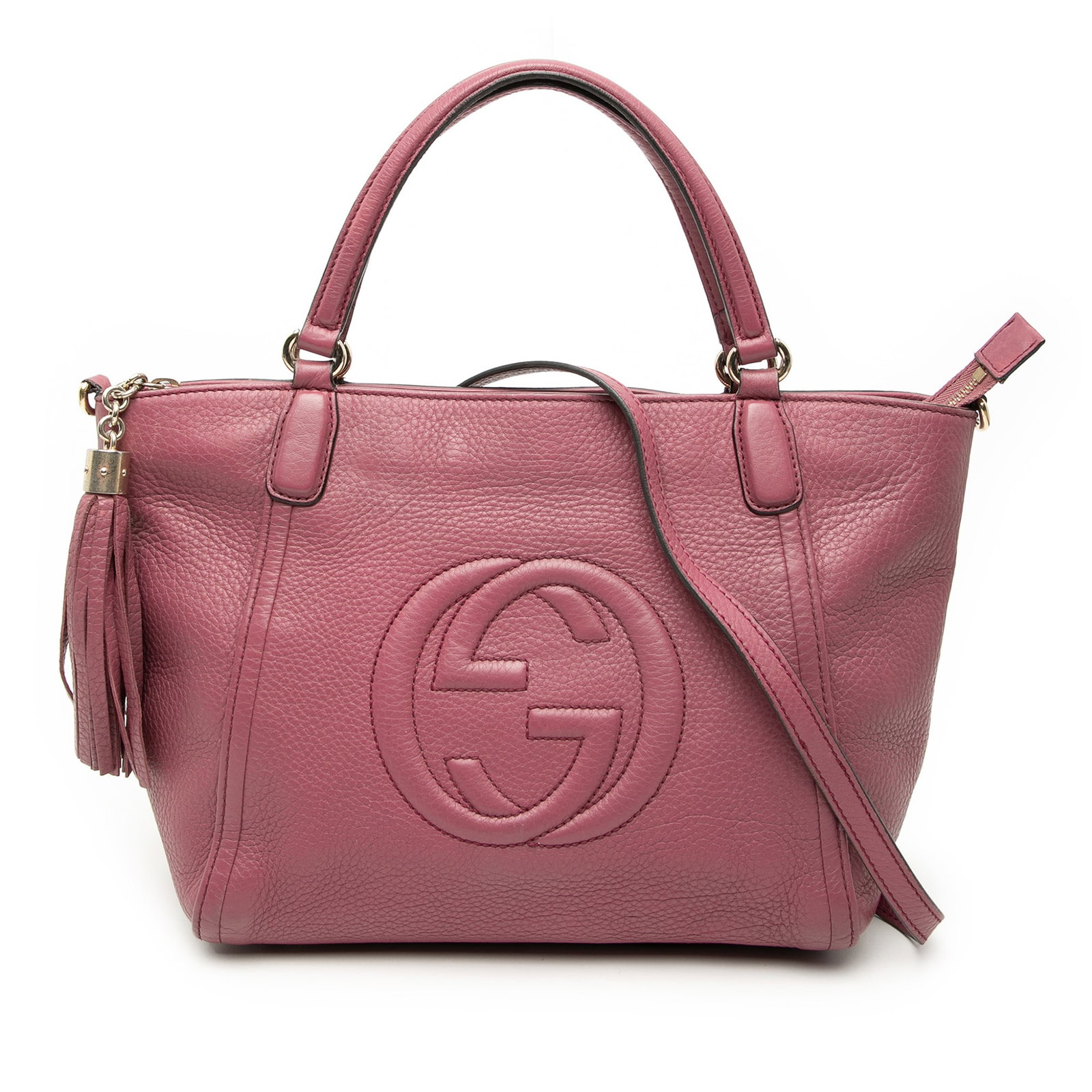 Pink Leather Soho Cellarius Satchel by Gucci with Tassel Accent: Pink Leather Soho Cellarius Satchel by Gucci with Tassel Accent This Gucci Small Calfskin Soho Cellarius Satchel features a pink leather body with flat leather handles, a detachable flat leather strap